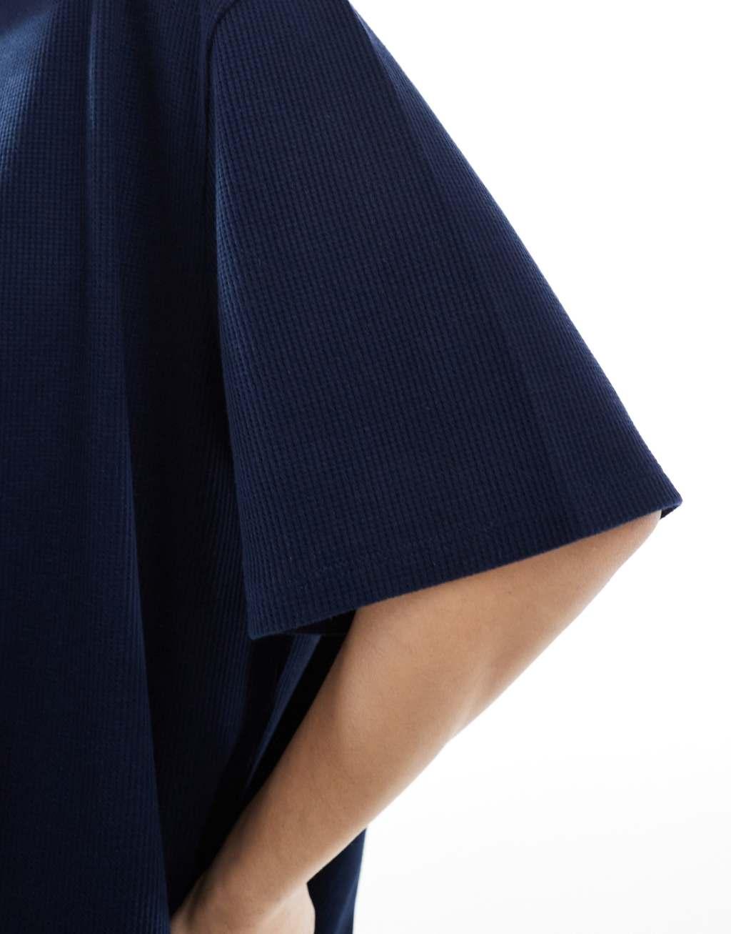 ASOS DESIGN oversized heavy weight waffle knit t-shirt with side slits in navy Product Image