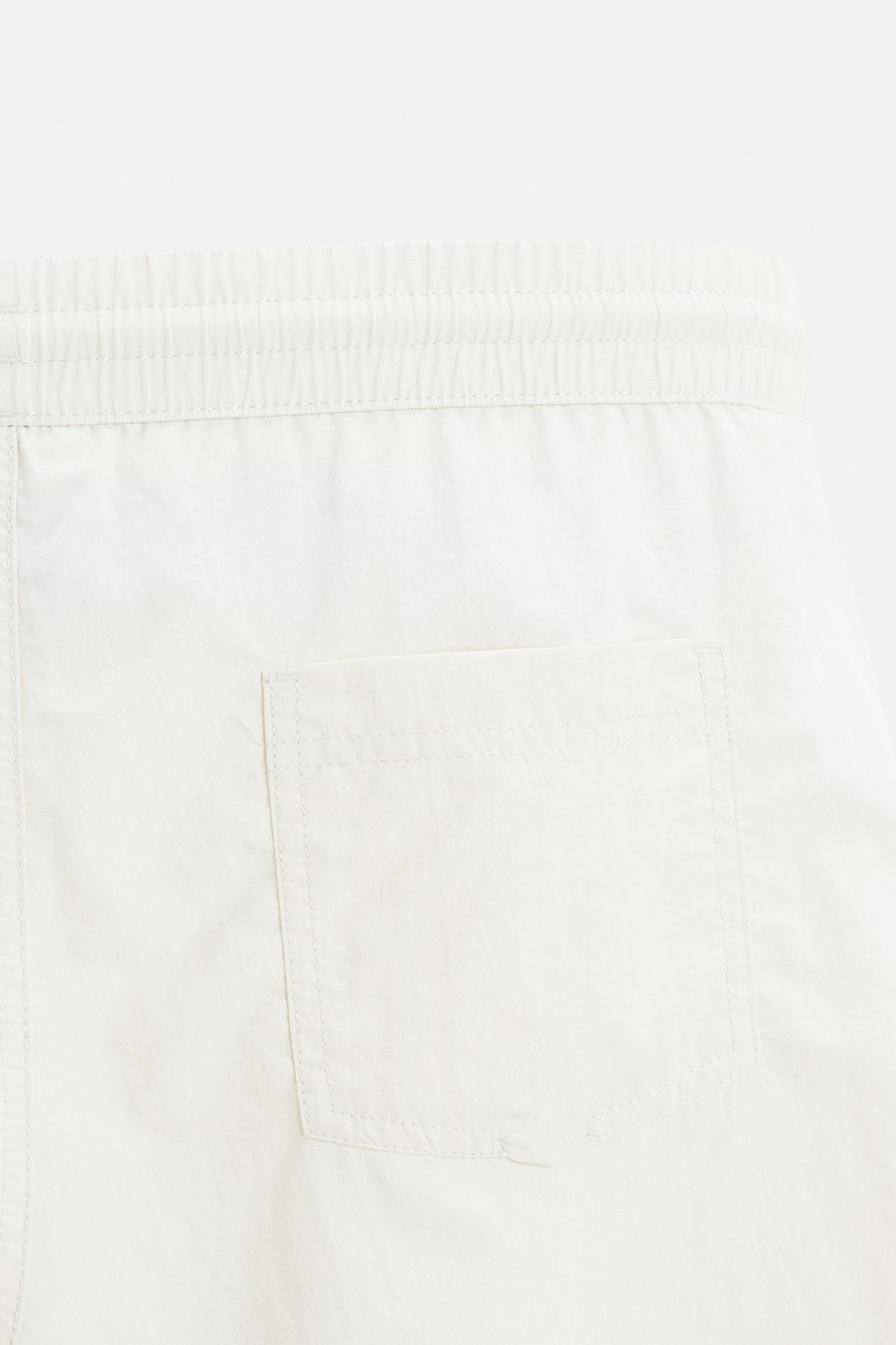 BASIC MID-LENGTH SWIMSUIT Product Image