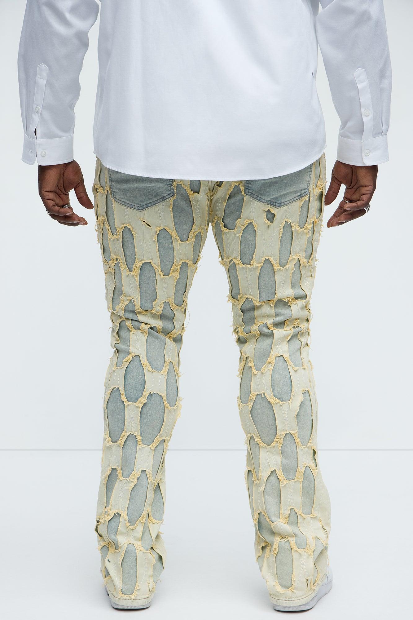 Shredded Distressed Stacked Skinny Flare Jeans - Medium Wash Product Image