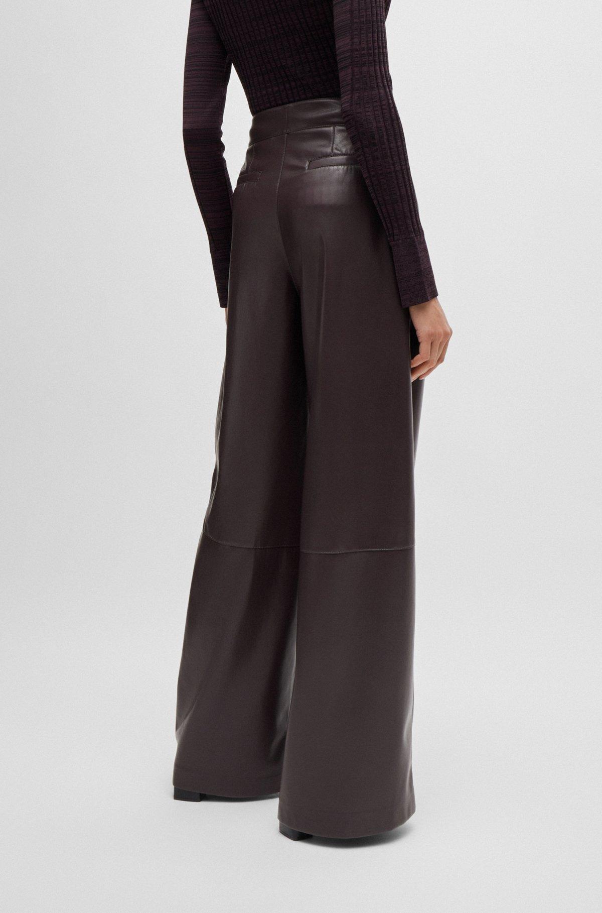 Pleat-front relaxed-fit trousers in faux leather Product Image