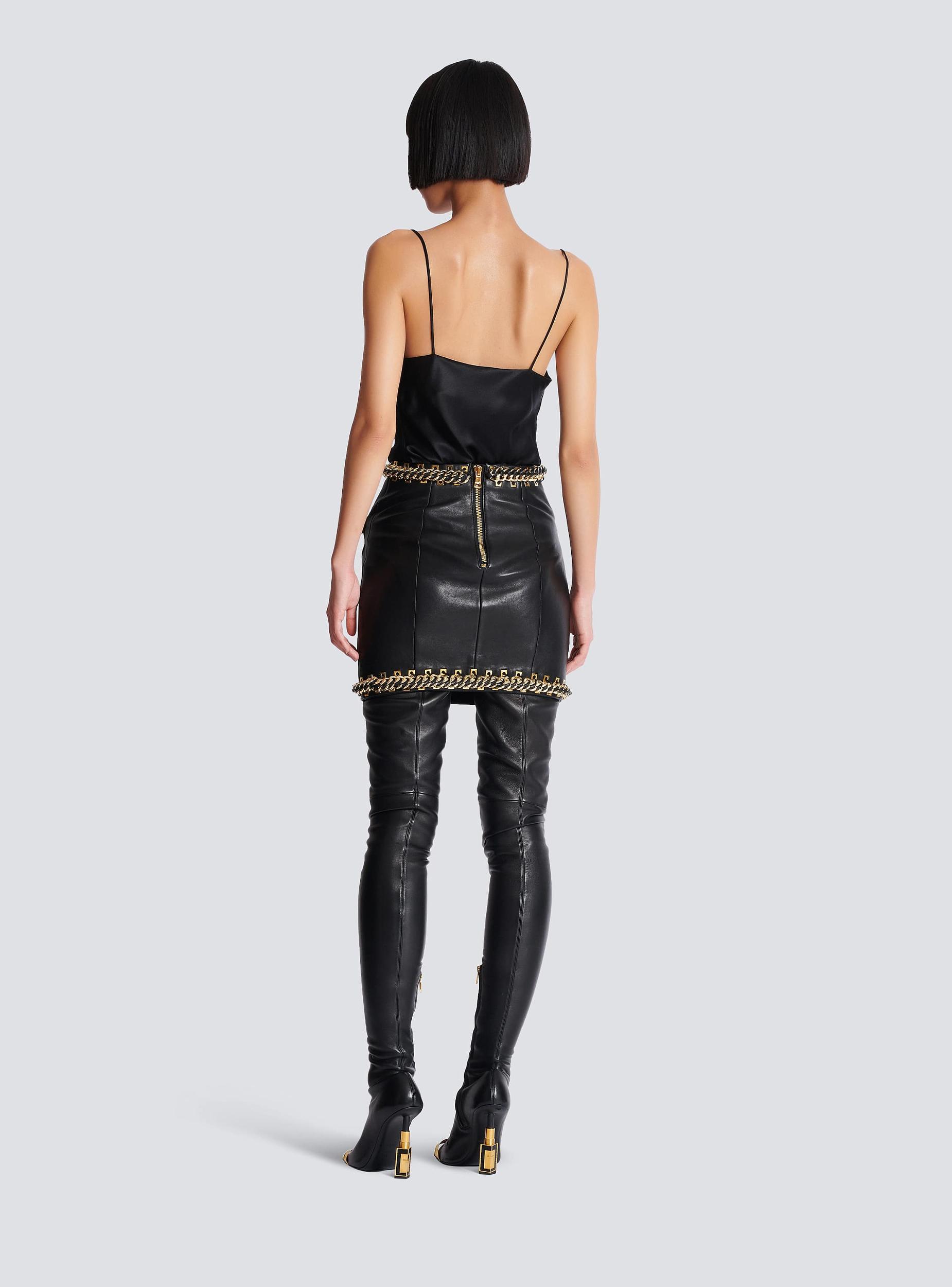 Short lambskin skirt with chains Product Image