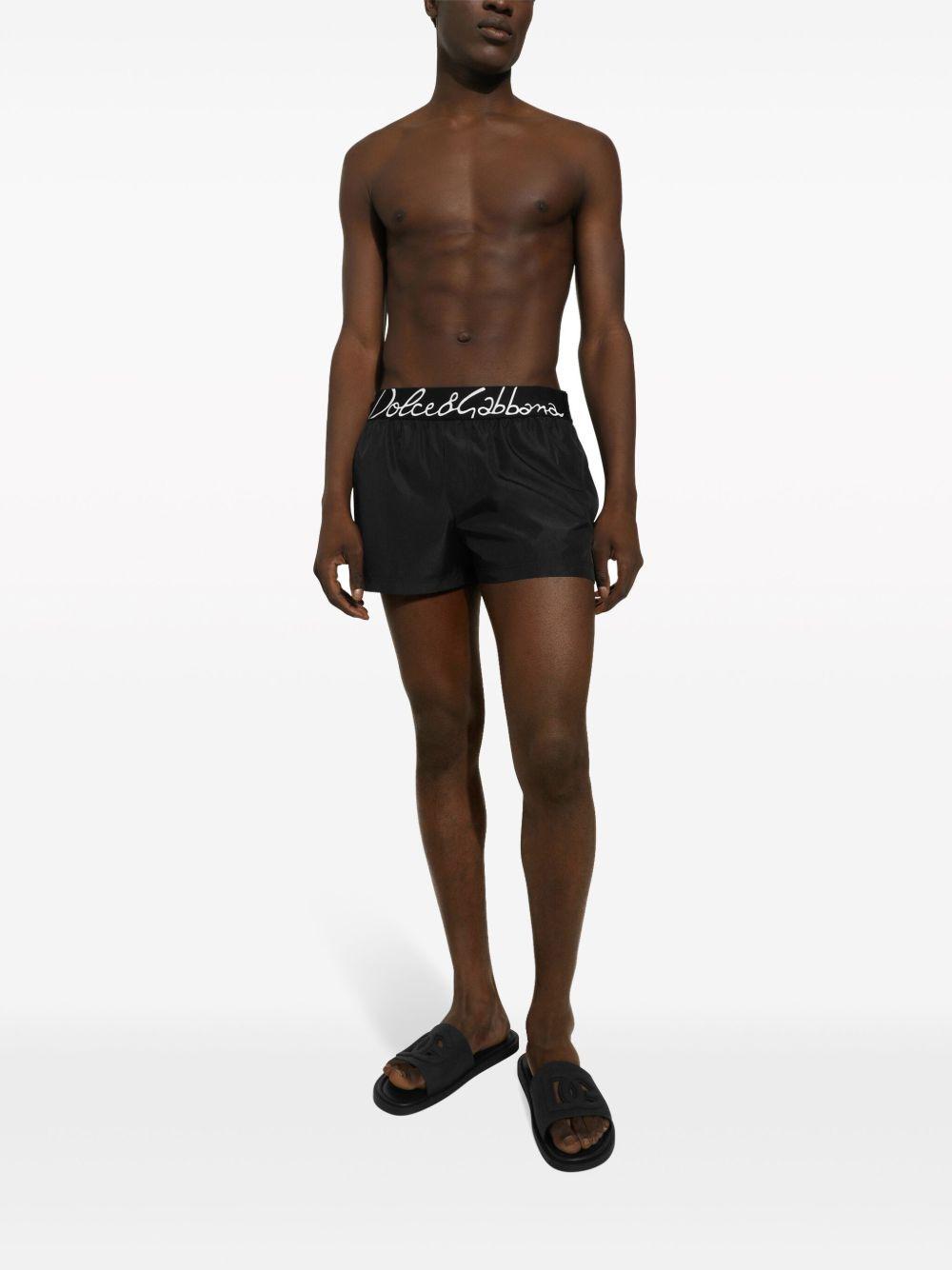 logo-waistband swim shorts Product Image