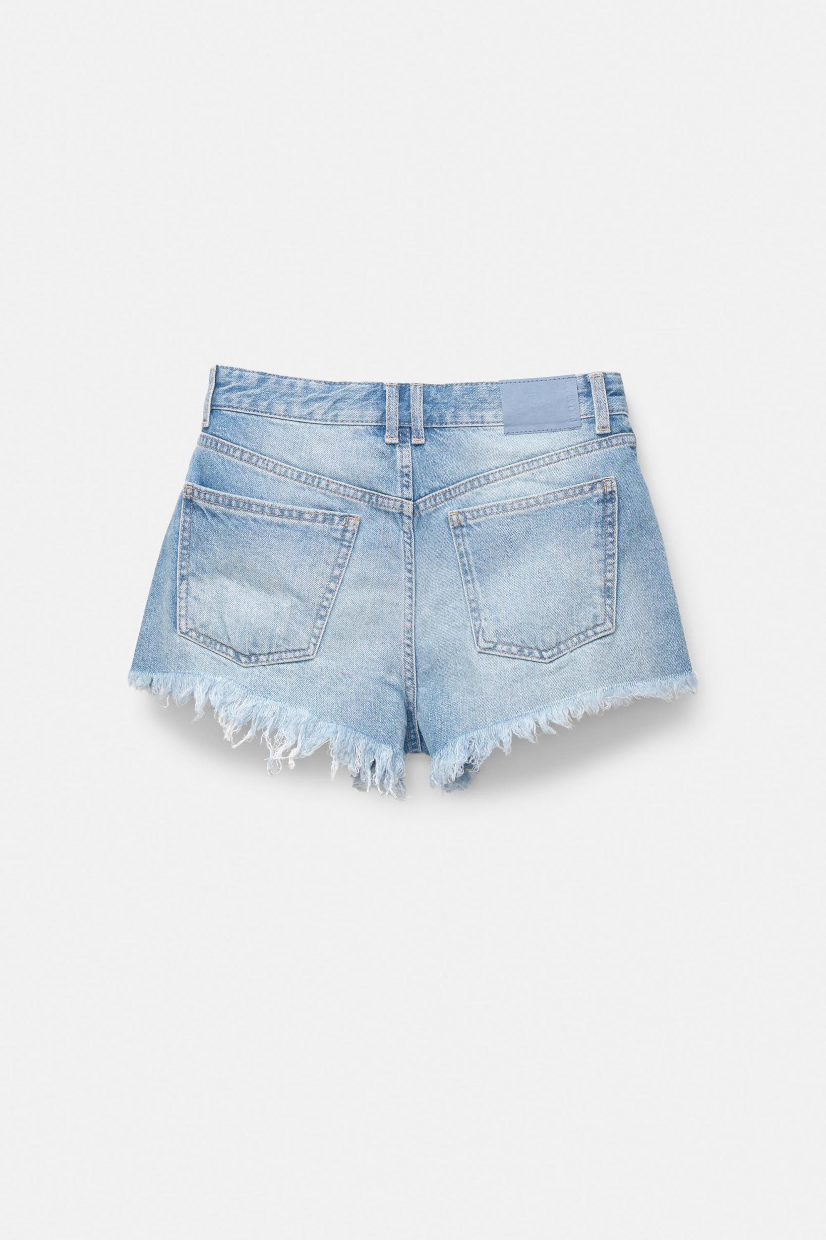 Ripped hem denim shorts Product Image