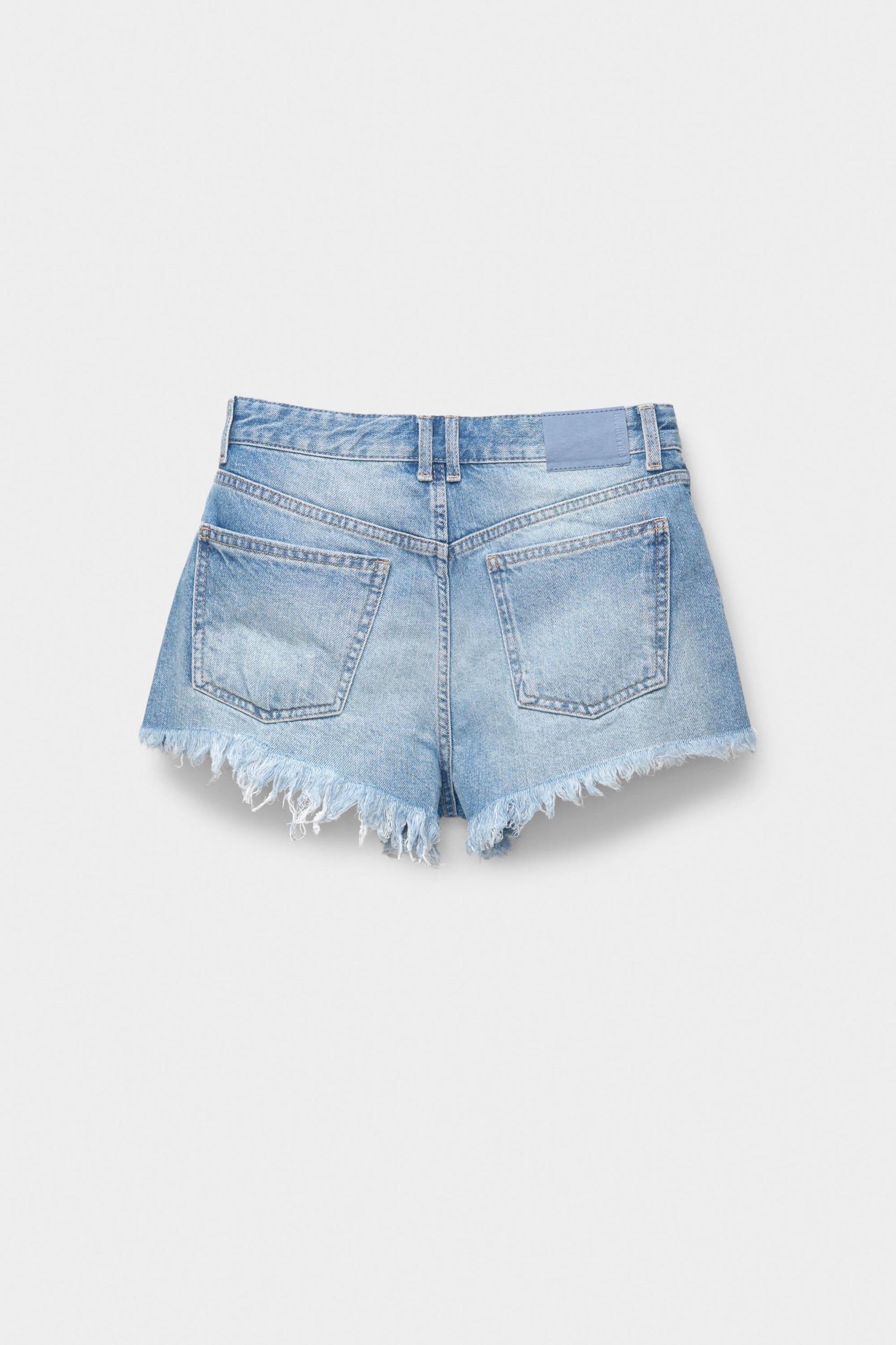 Ripped hem denim shorts Product Image