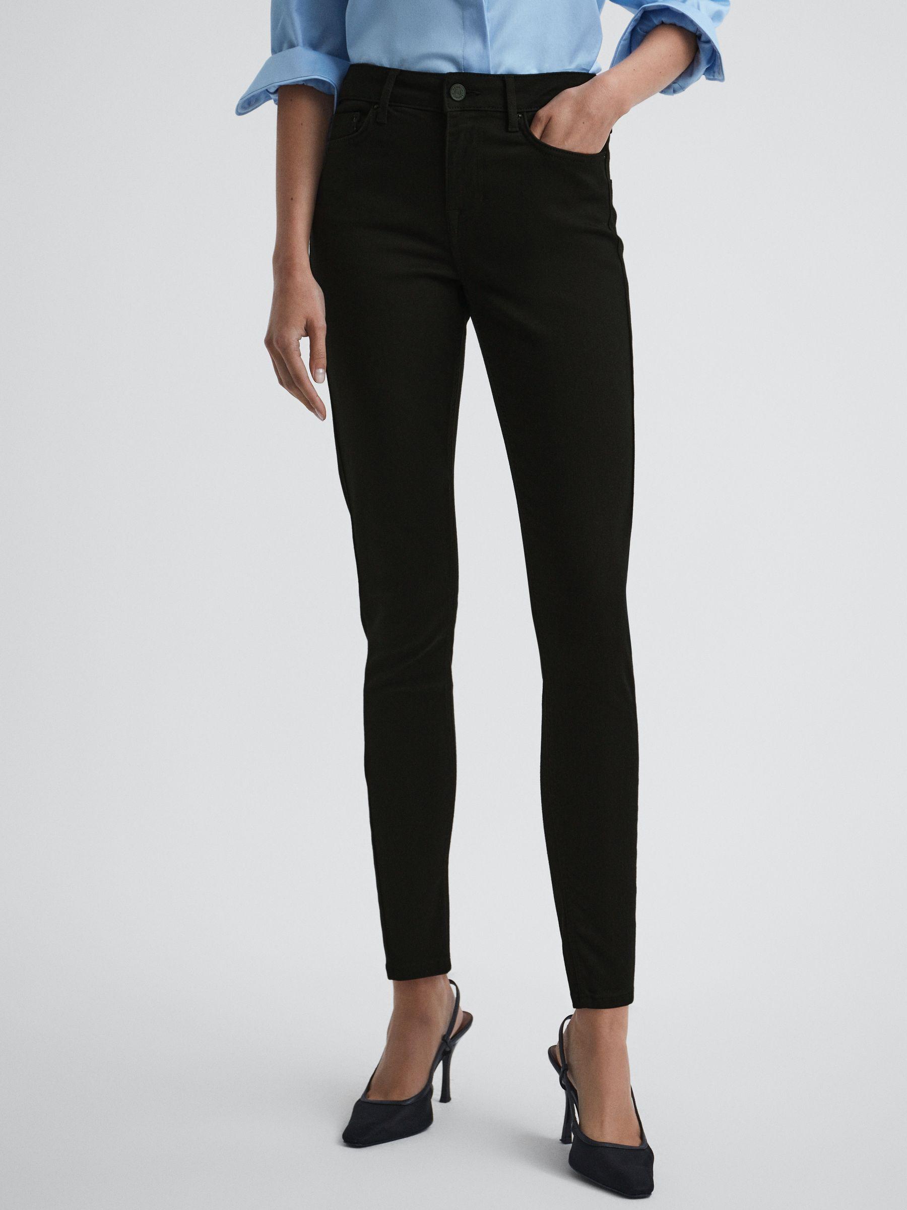 Mid Rise Skinny Jeans in Black Product Image