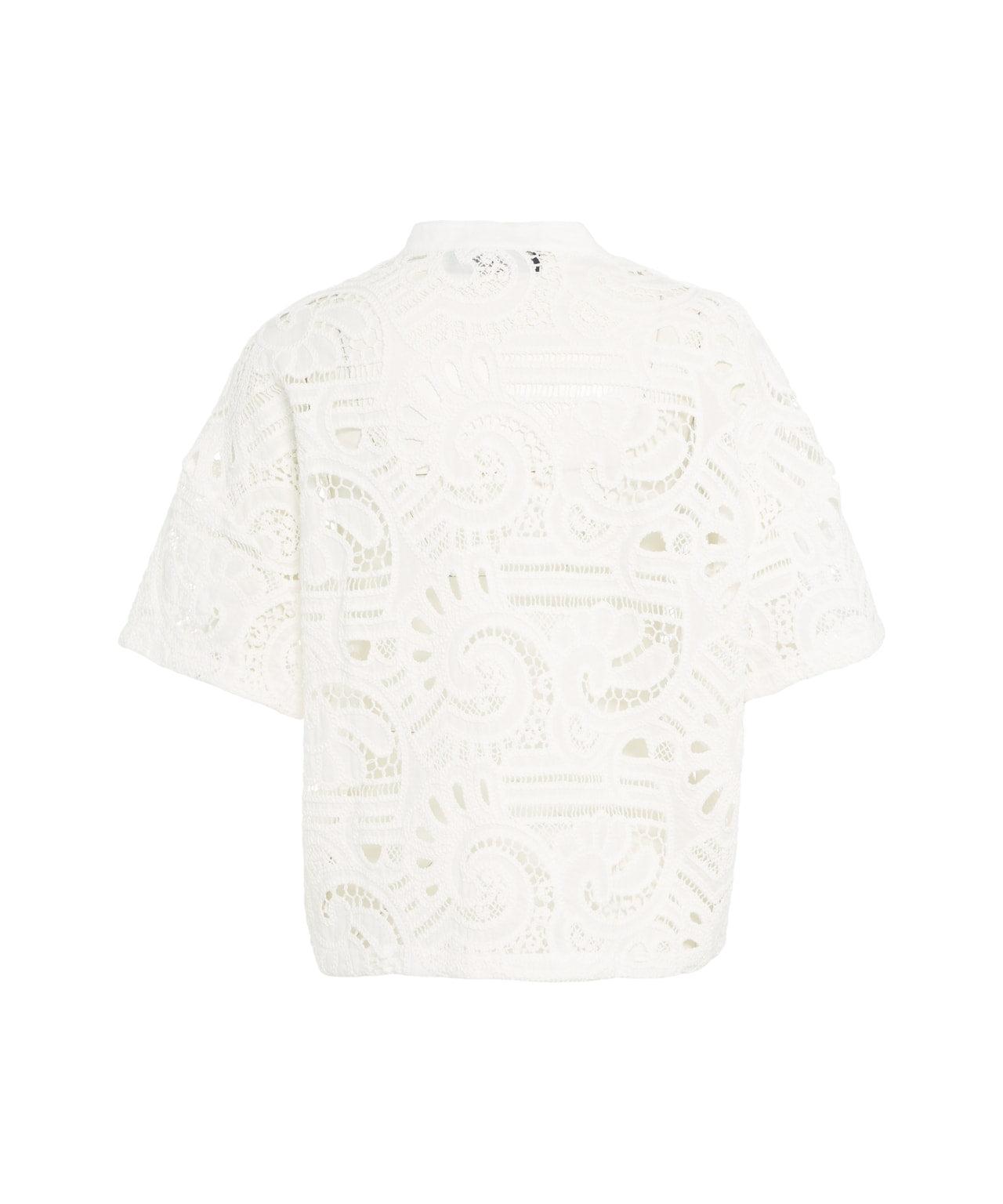 Blouse with perforated embroidery Product Image