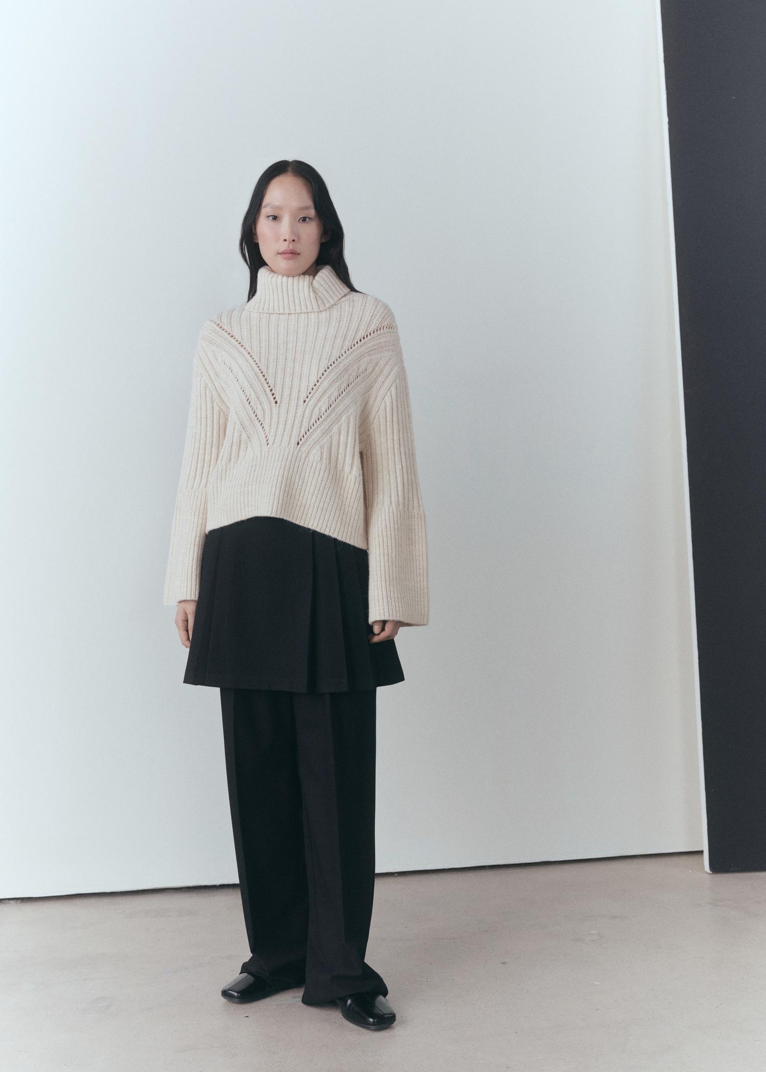 Turtleneck sweater with unstitched detail - Women | MANGO USA Product Image