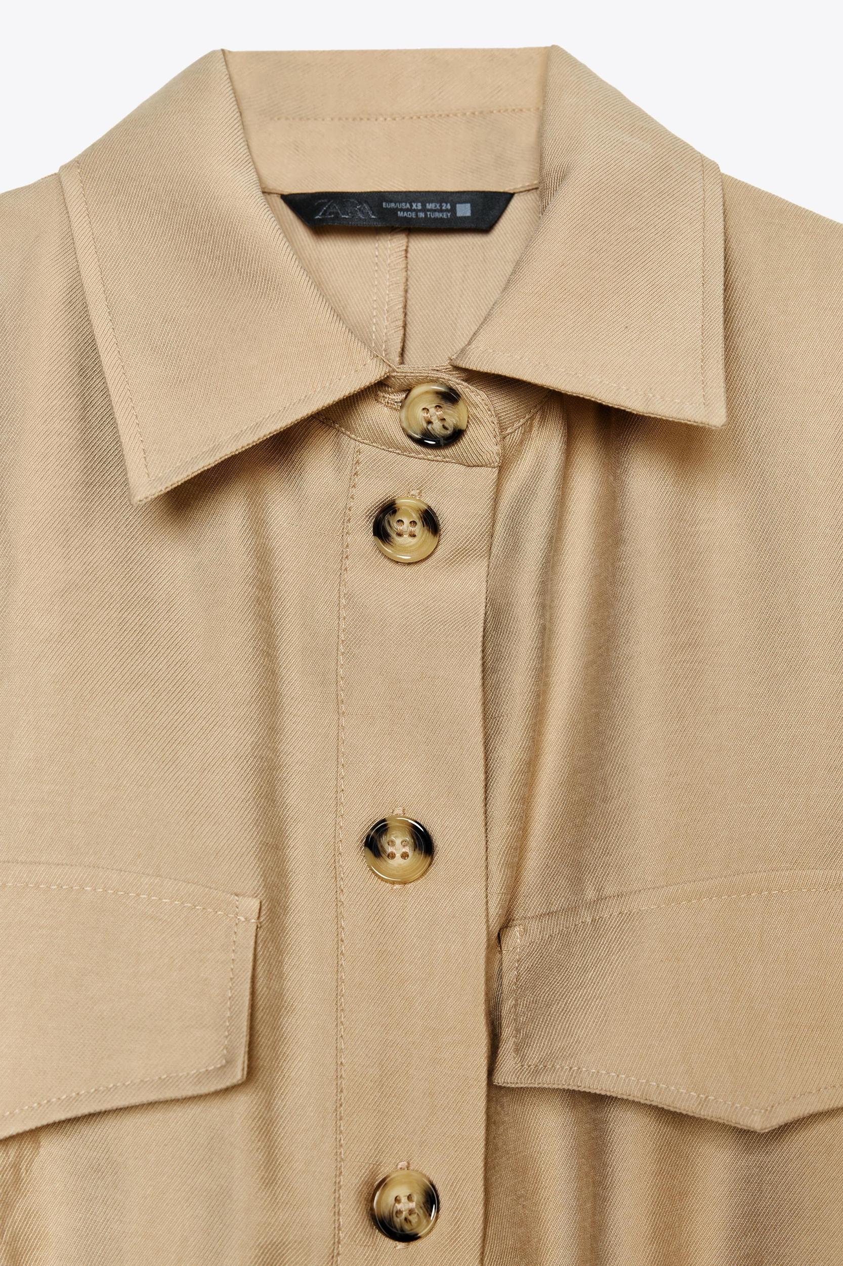 SLEEVELESS BELTED JUMPSUIT Product Image