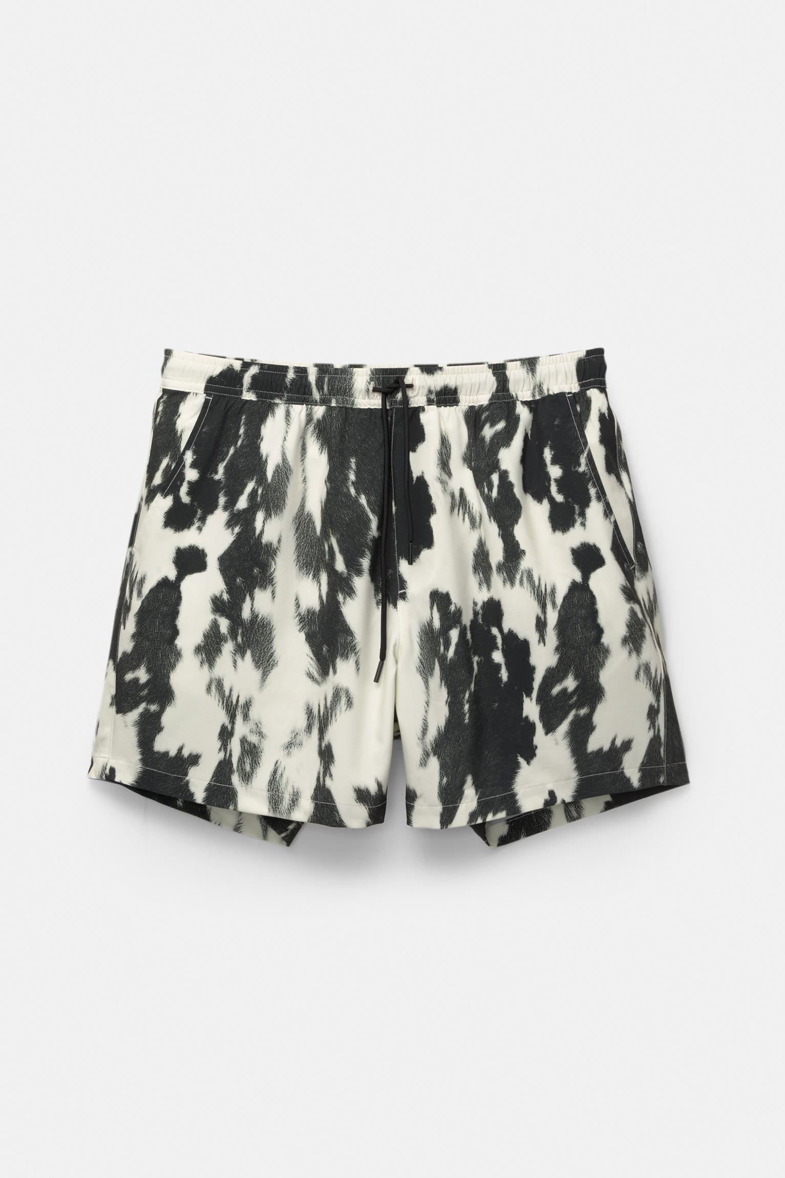 Cow animal print board shorts Product Image