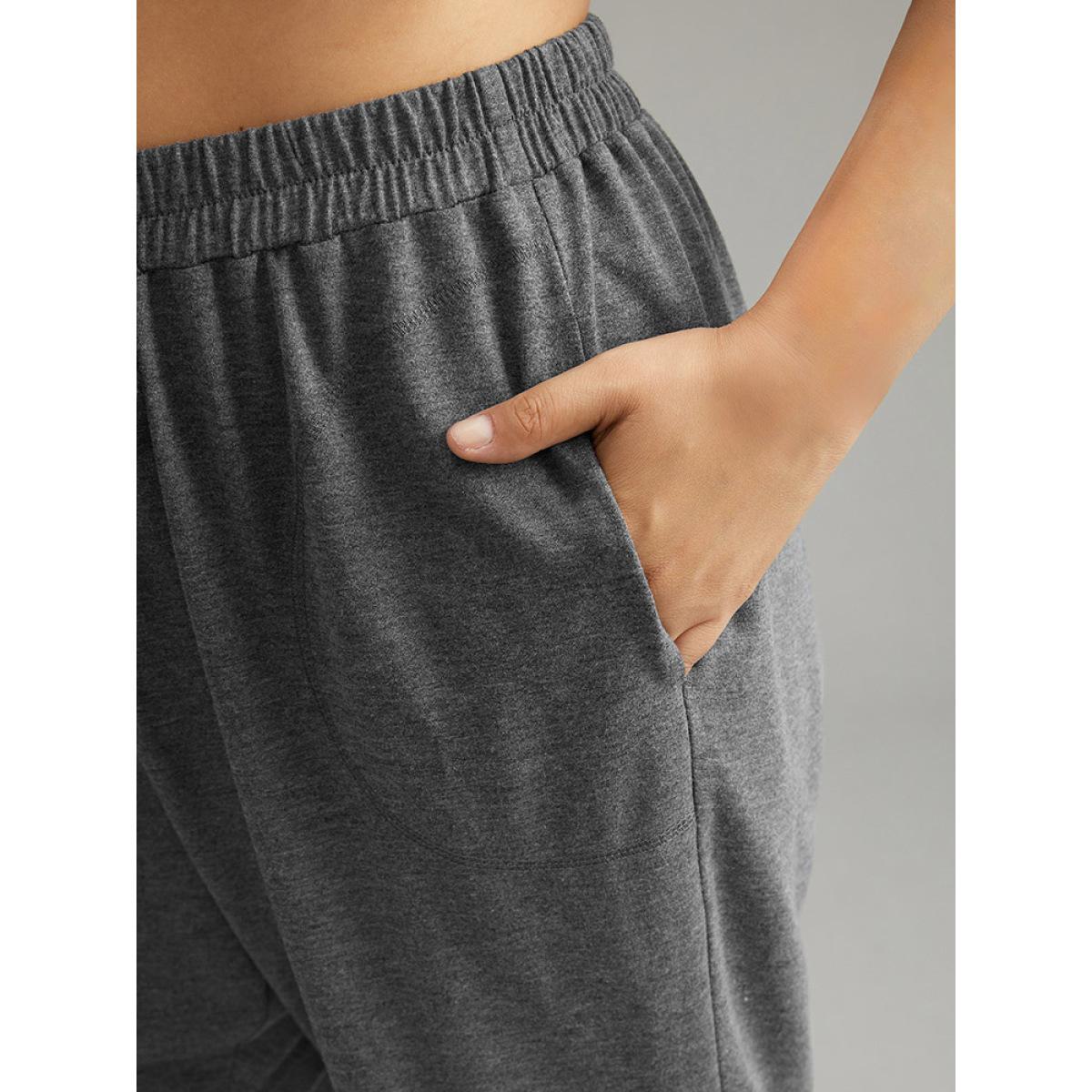 Plus Size Solid Pocket Knotted Flare Leg Pants Women Gray Casual Flare Leg High Rise Dailywear Pants BloomChic 10/M Product Image