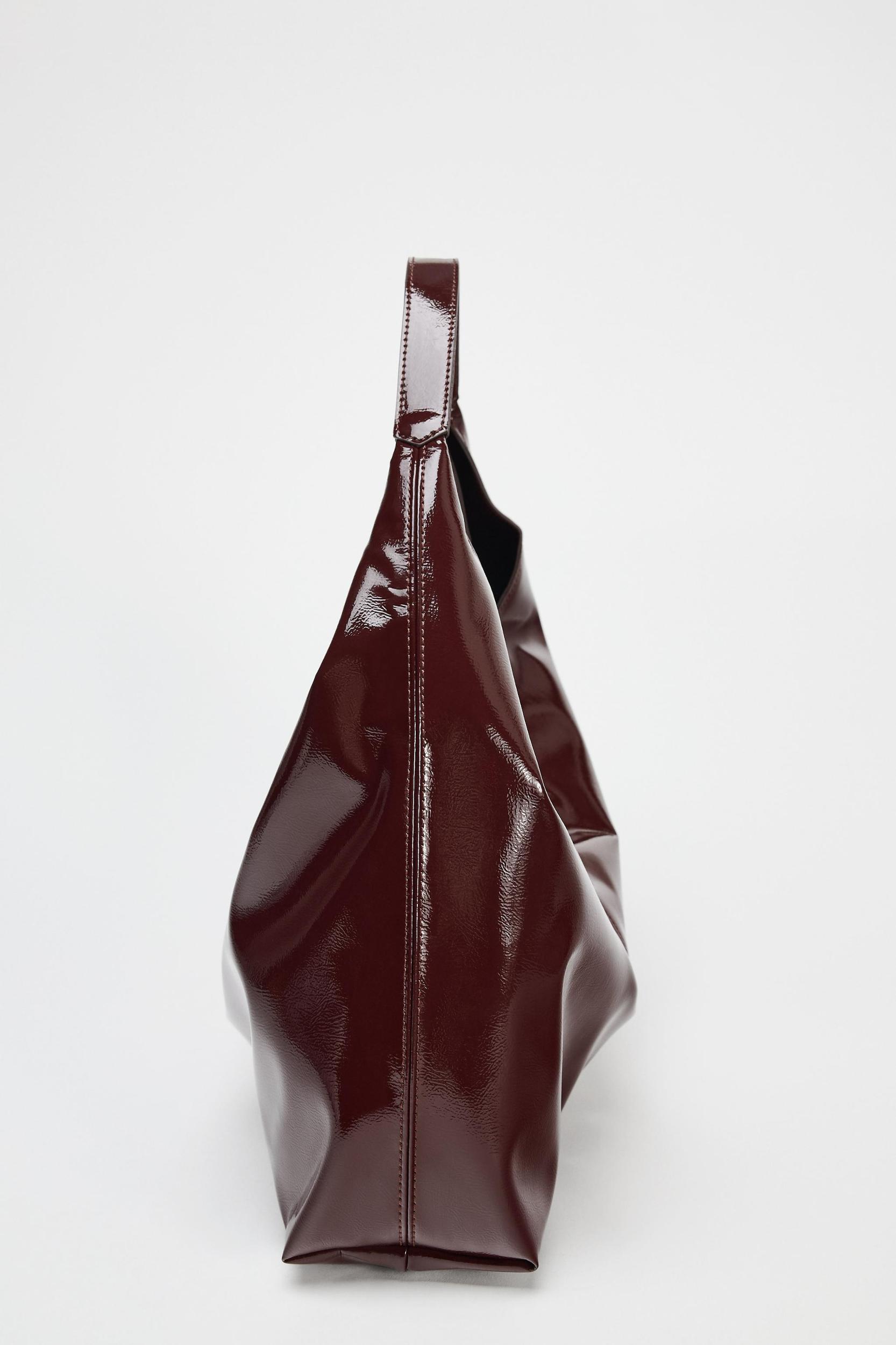 PATENT FINISH BUCKET BAG Product Image