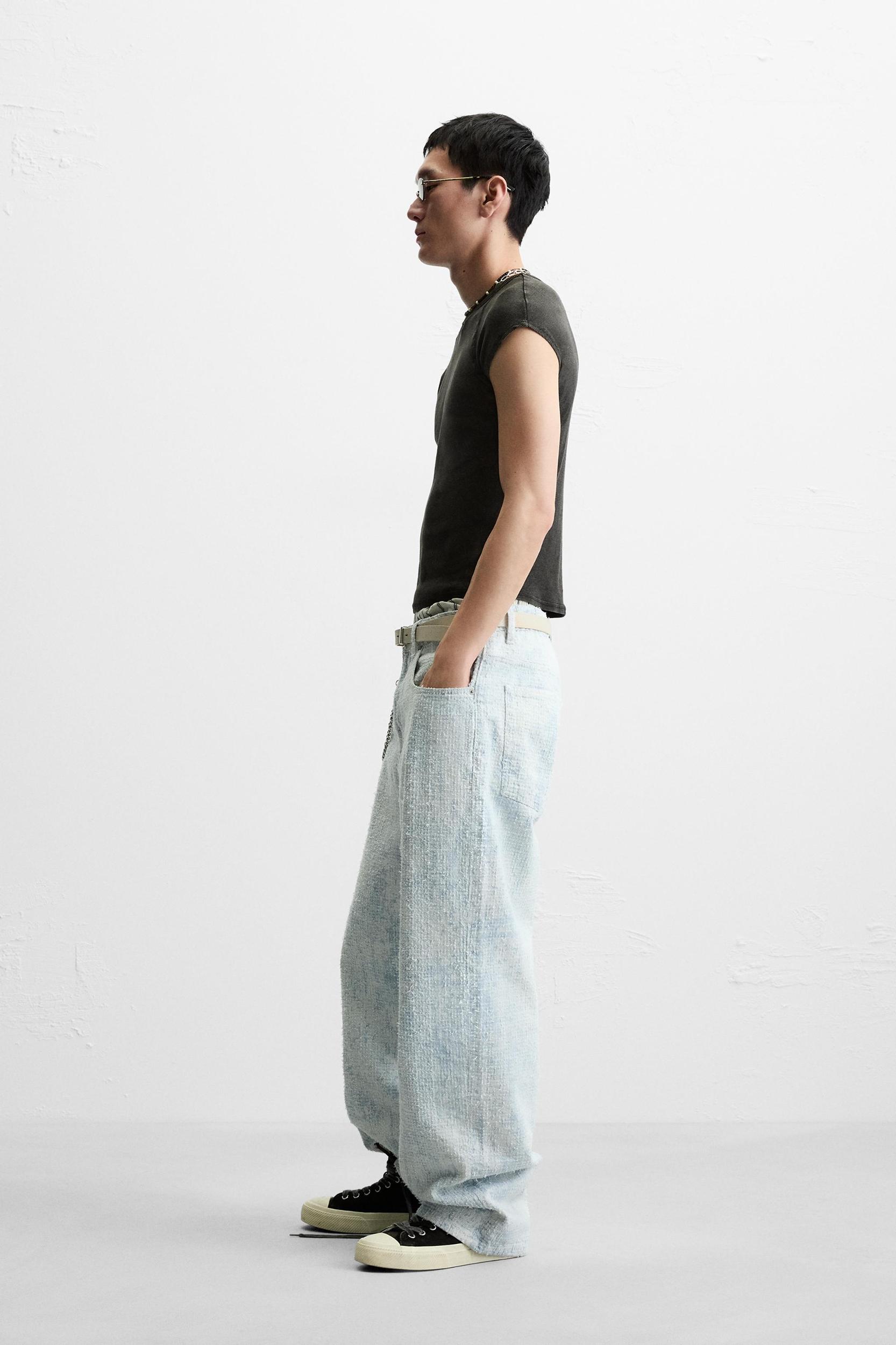 DISTRESSED FINISH BAGGY FIT JEANS Product Image