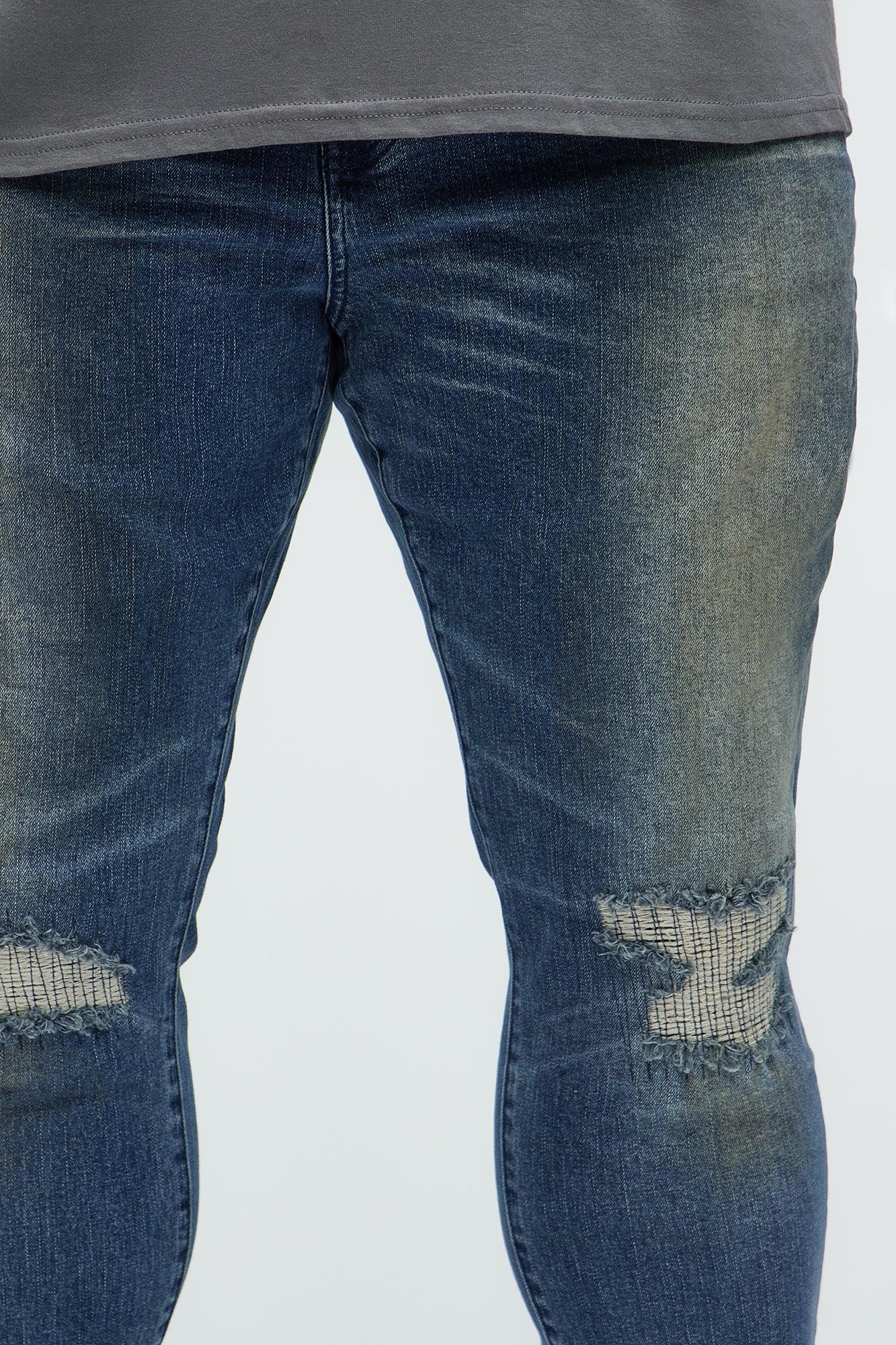 Faded In And Out Repaired Skinny Jeans - Dark Wash Product Image