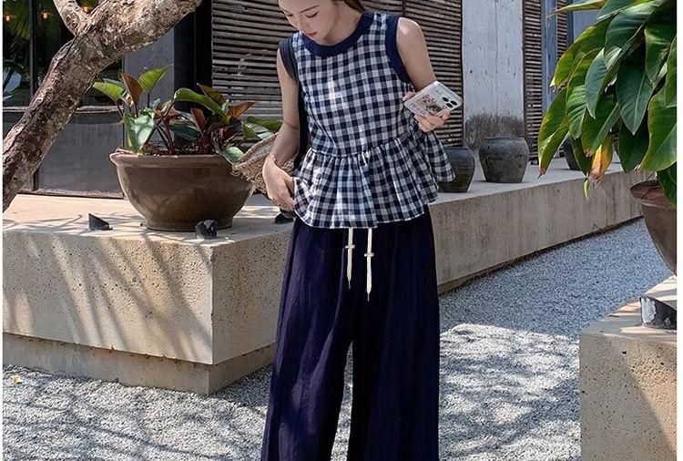Maternity Set: Sleeveless Round Neck Plaid Peplum Top + Drawstring Waist Panel Wide Leg Pants Product Image