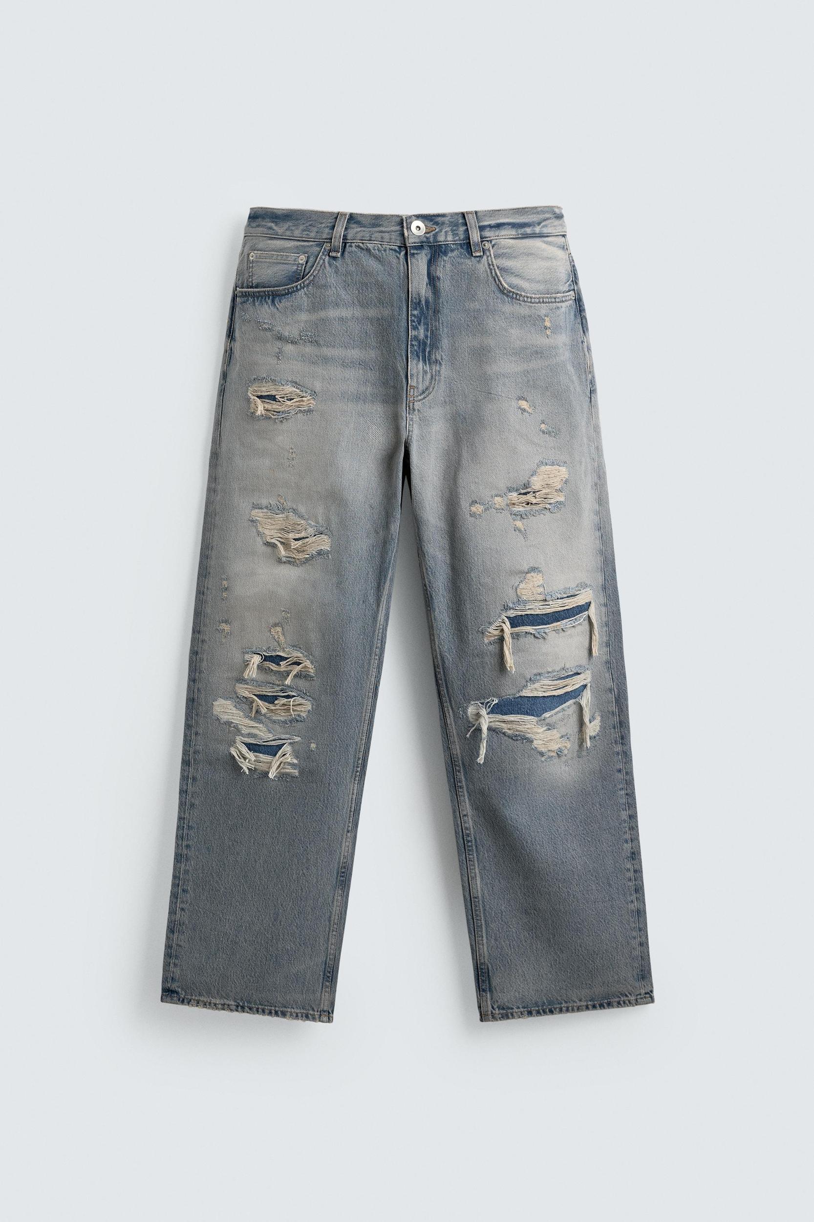 LOOSE FIT RIPPED JEANS Product Image