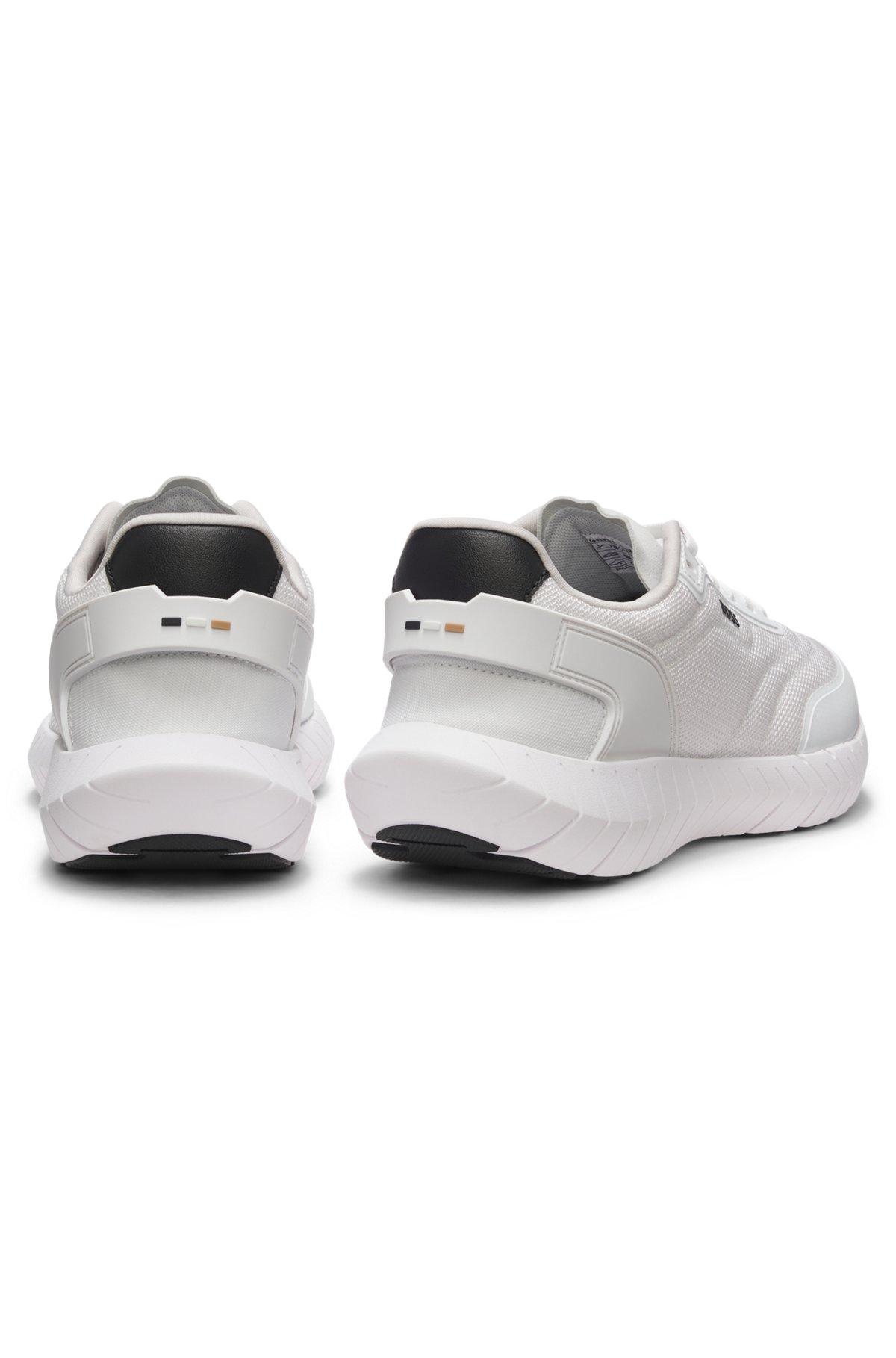 Running sneakers with leather trims Product Image