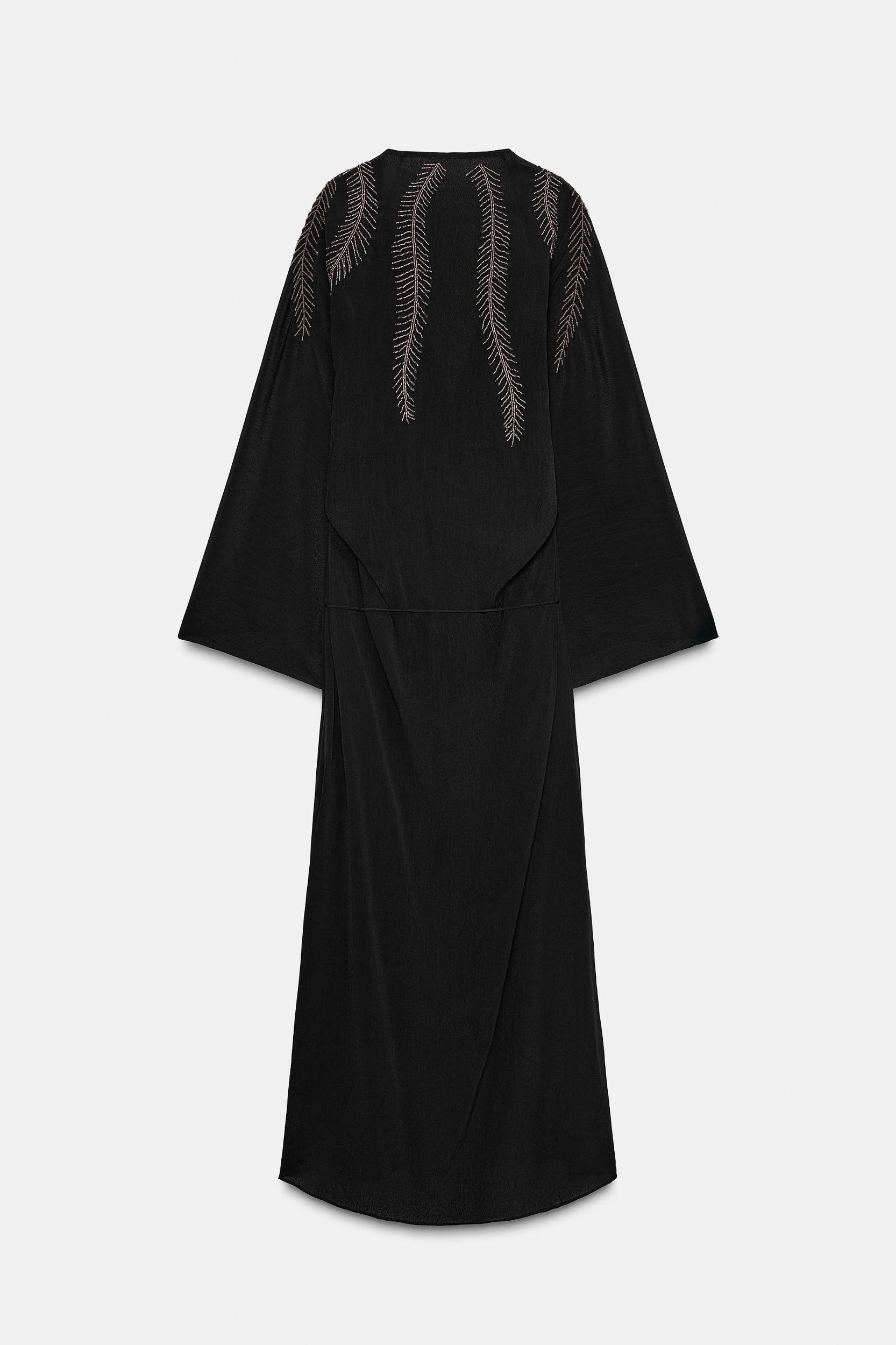 Plus Size Sheer Lace Sleeve Fit and Flare Midi Dress Black Women At the Office Woven ribbon&lace trim Asymmetrical Neck Elbow-length sleeve Curvy BloomChic 26/4X Product Image