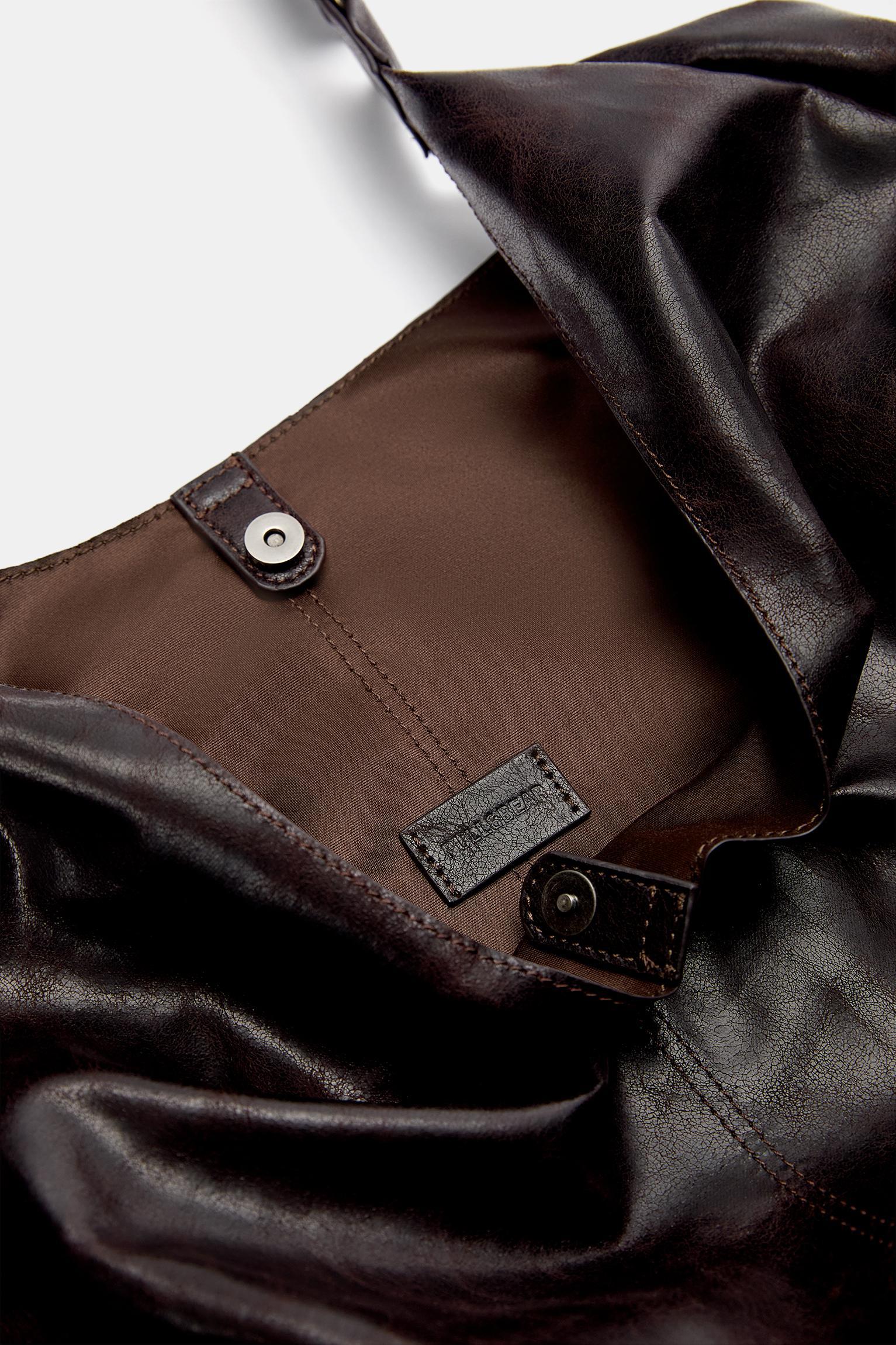 Distressed shopper bag with rings Product Image