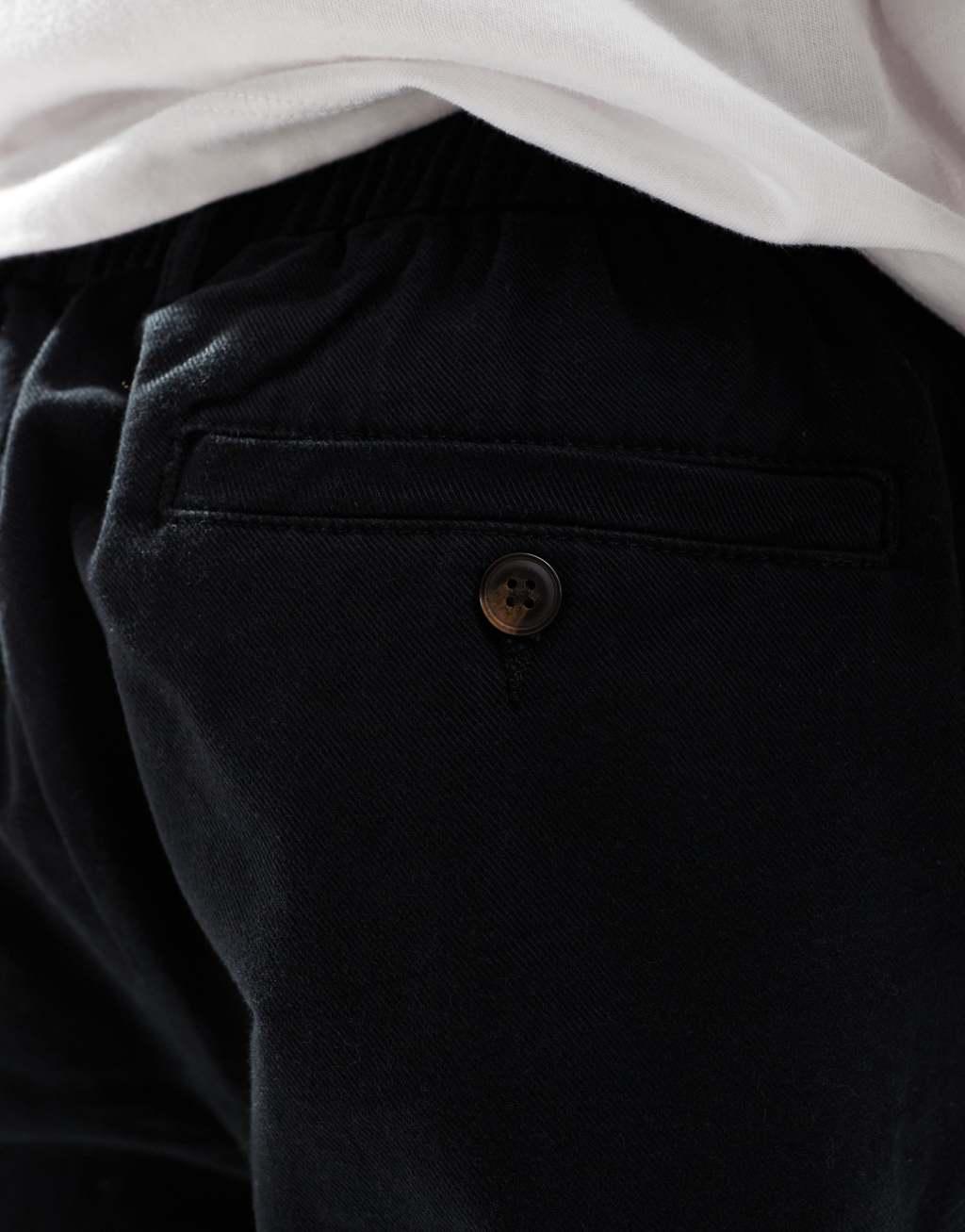 Jack & Jones loose fit pull-on chinos with pleated front in black Product Image