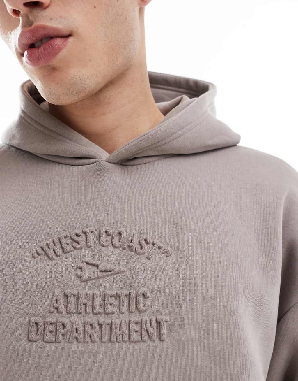 Bershka hoodie with embossed print in beige Product Image