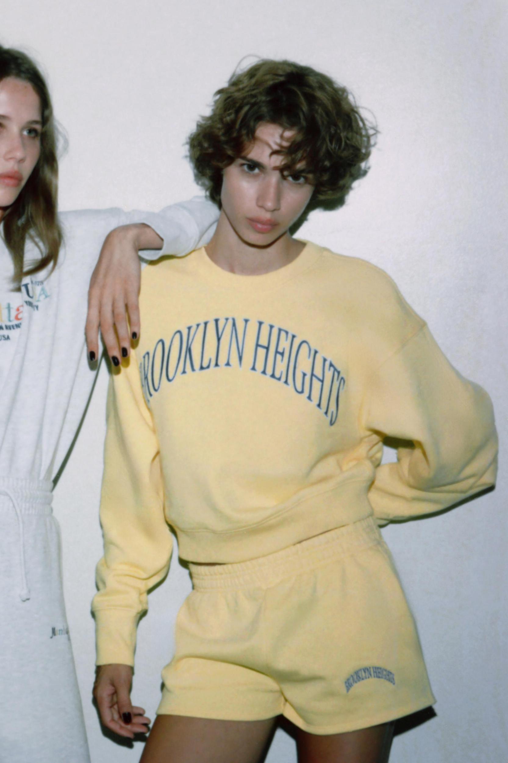 EMBROIDERED TEXT FLEECE SHORTS Product Image