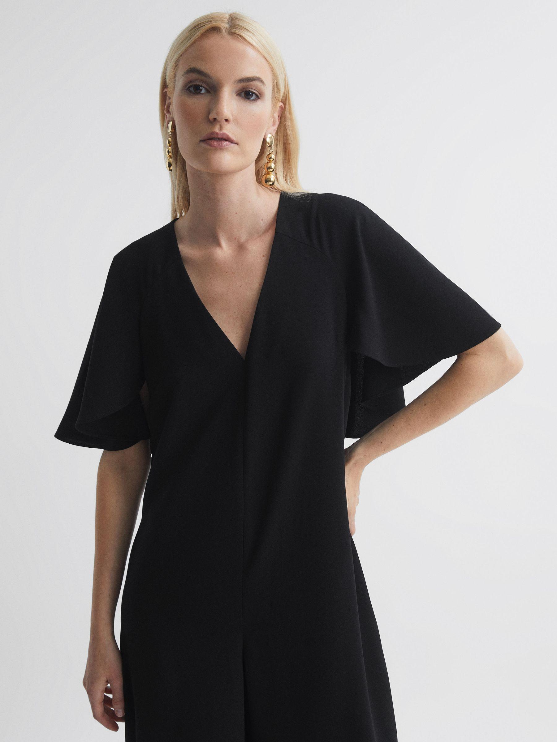 Florere Relaxed Fit Cape Sleeve Jumpsuit in Black Product Image