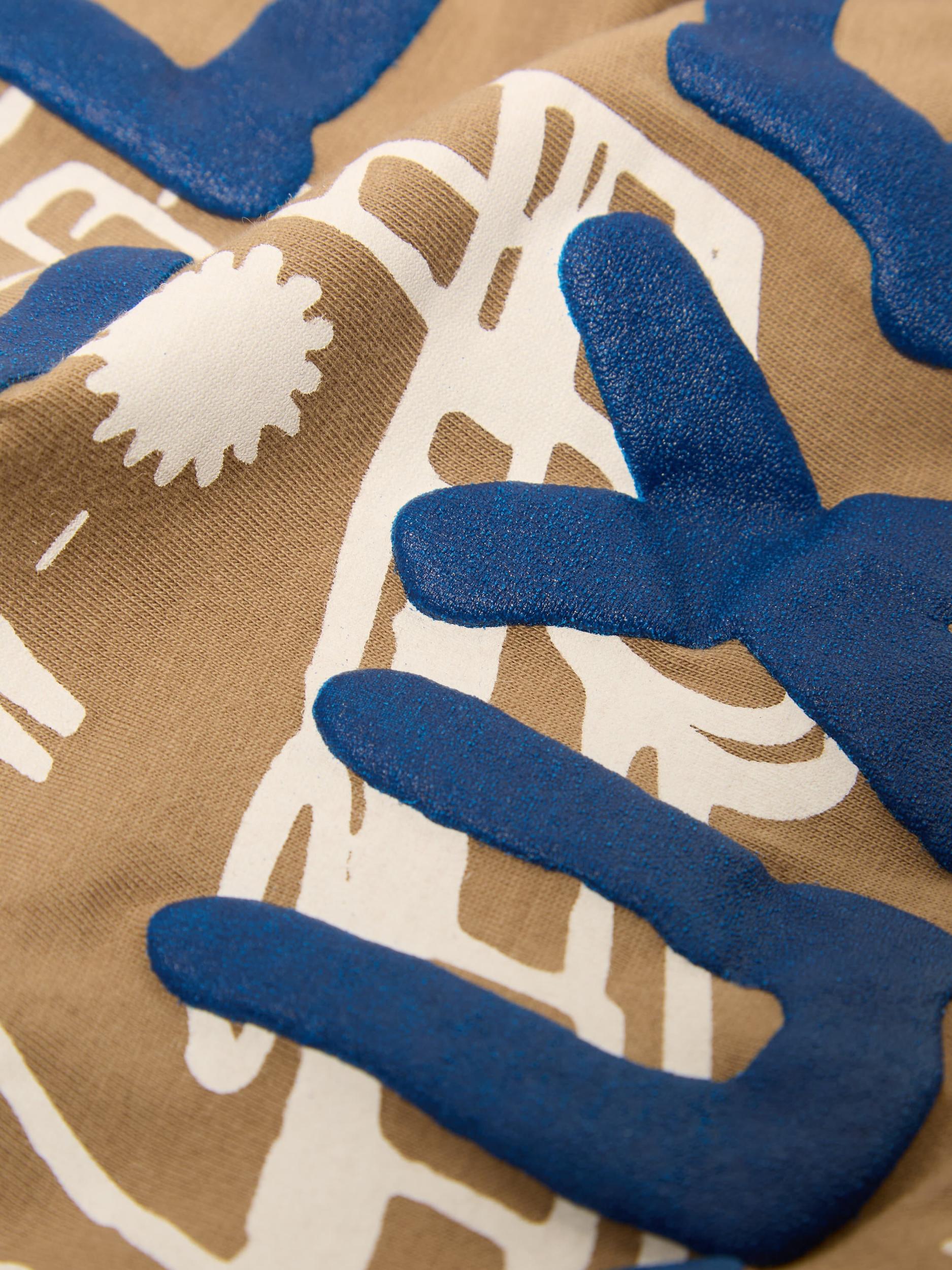 Universal Works Print Tee in Sand 'Hotel Deluxe' Single Jersey Product Image