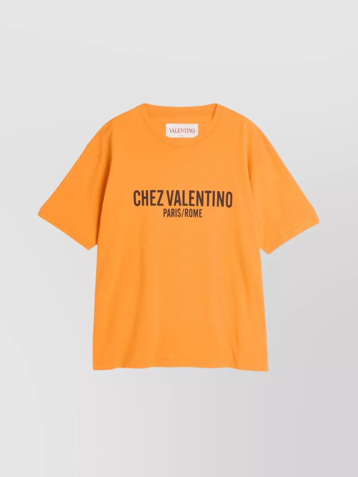 VALENTINO Cotton T-shirt With Chez Print In Orange Product Image
