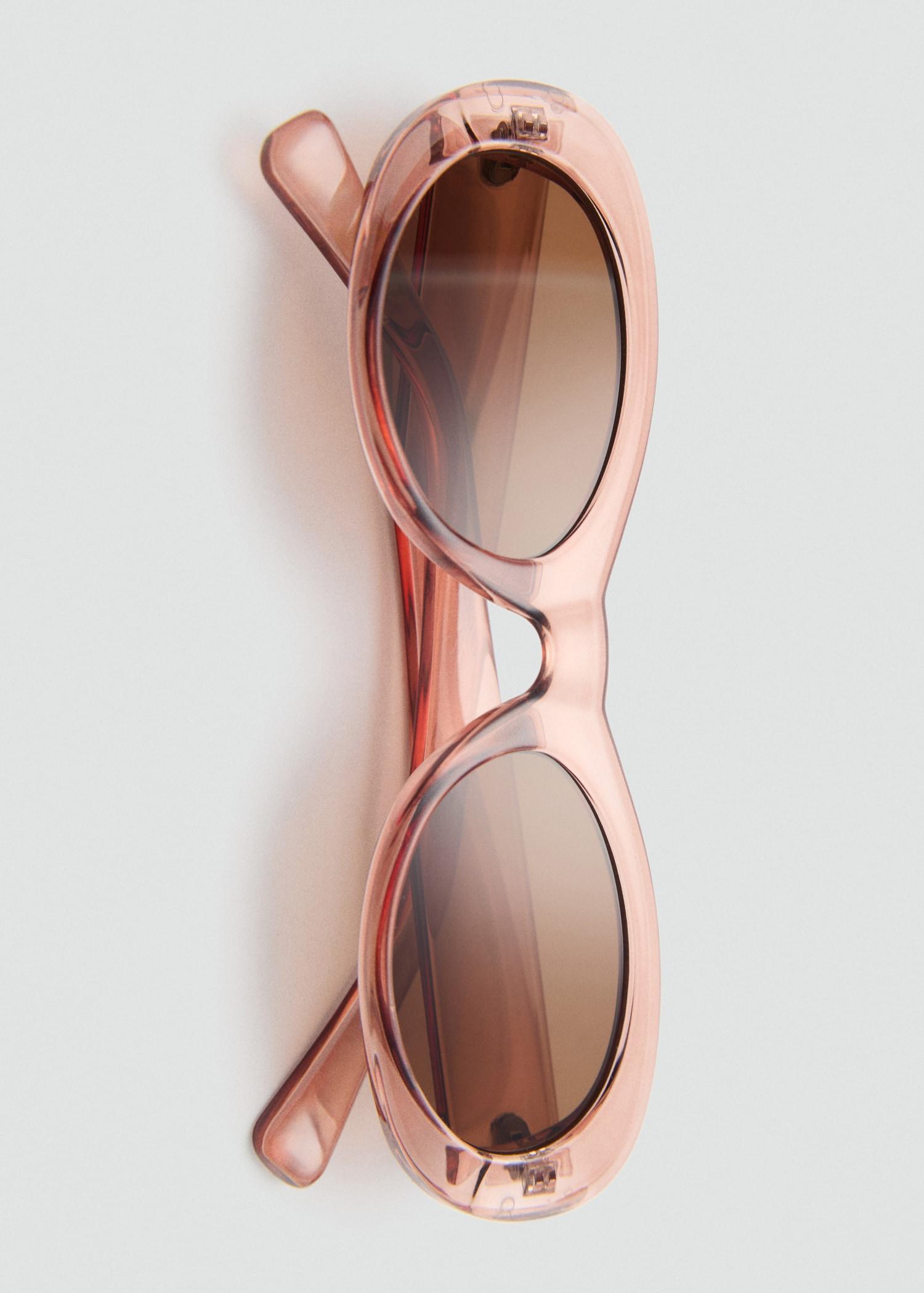 Oval-frame sunglasses - Women | MANGO USA Product Image