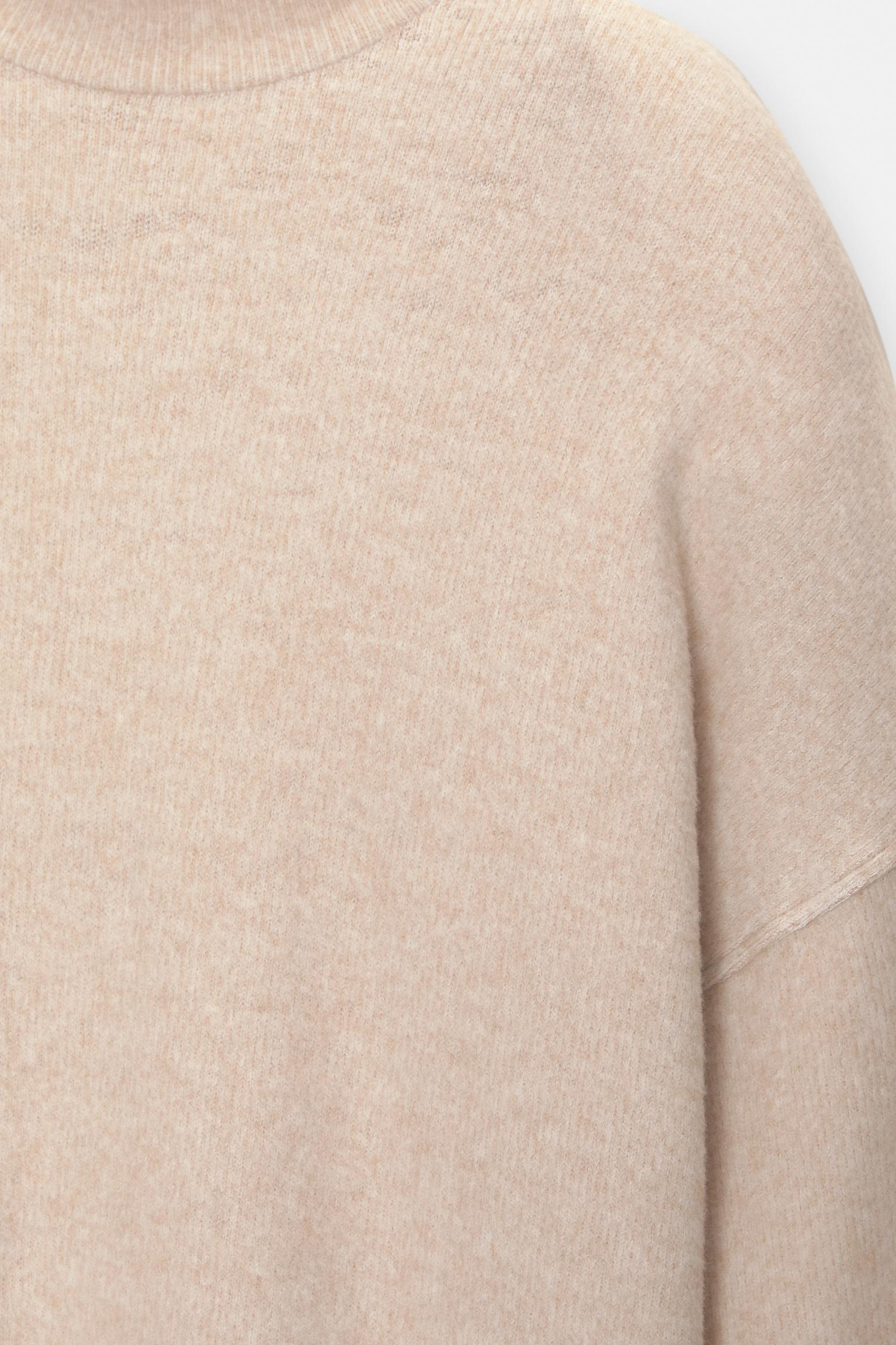 Soft touch high neck sweater Product Image