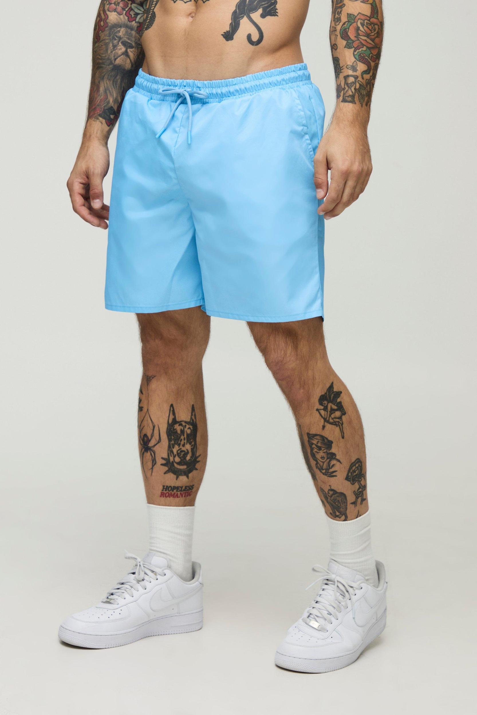 2 Pack Wide Stripe and Plain Mid Length Swim Trunks | boohooMAN USA Product Image