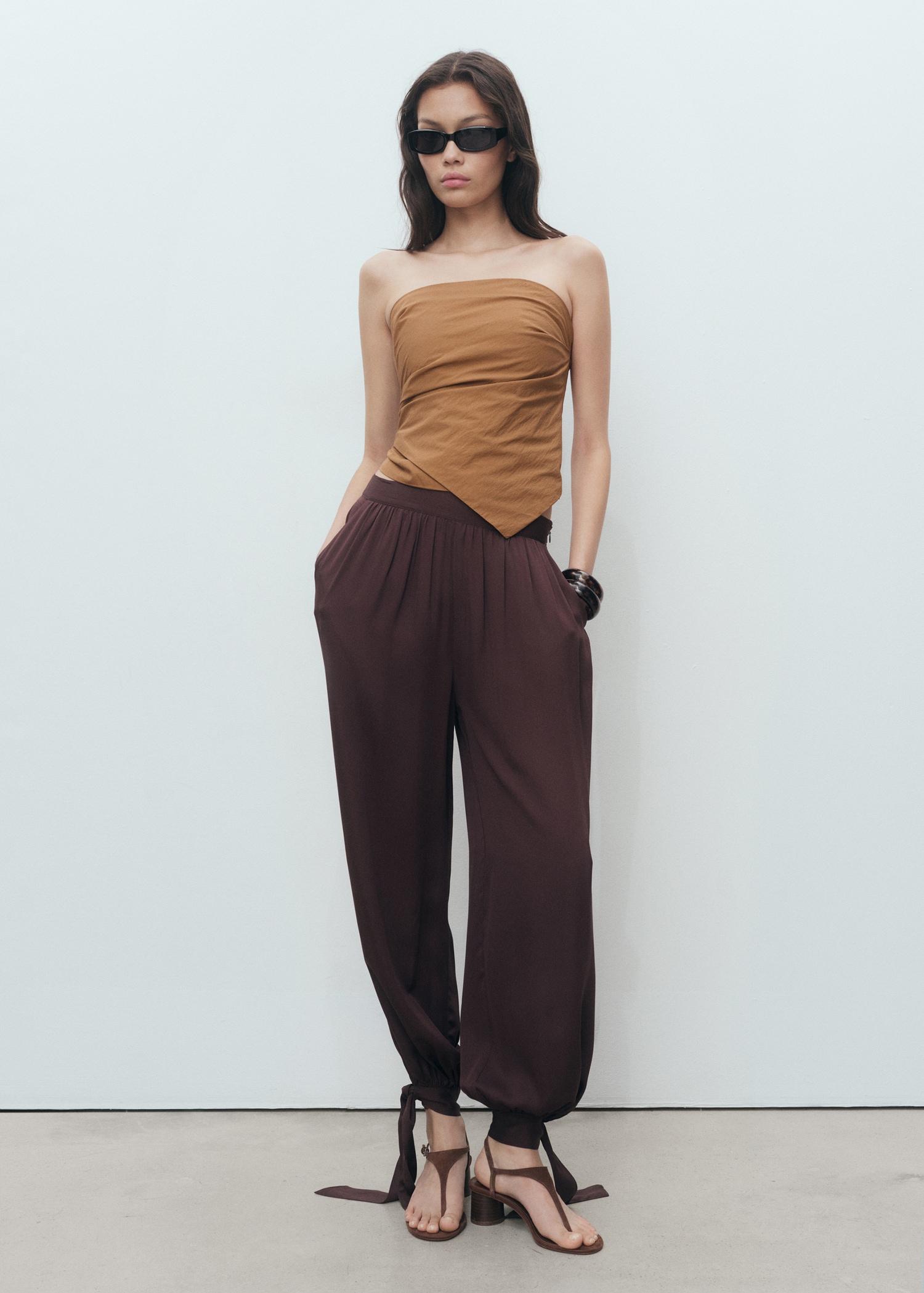 Asymmetrical strapless top - Women | MANGO USA Product Image
