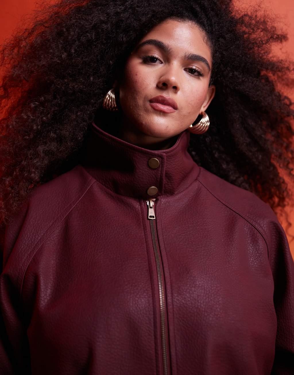 ASOS DESIGN Curve leather look bomber jacket in burgundy Product Image