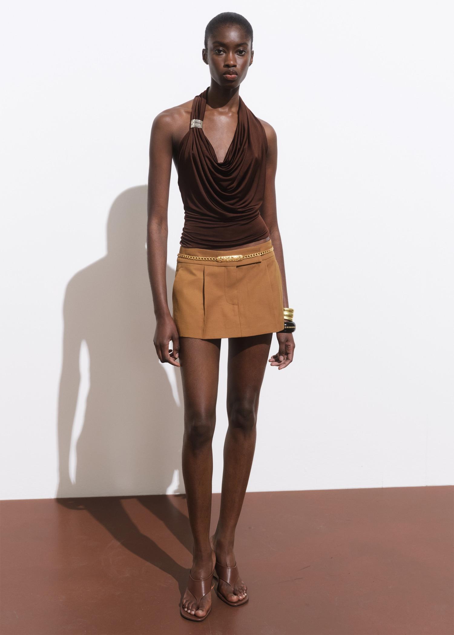 Mini-skirt with pleats - Women | MANGO USA Product Image