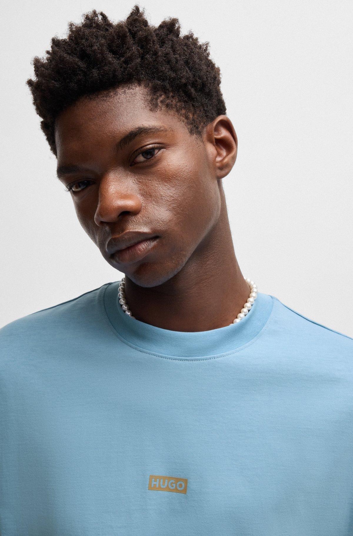 Loose-fit T-shirt in cotton with rear logo artwork Product Image