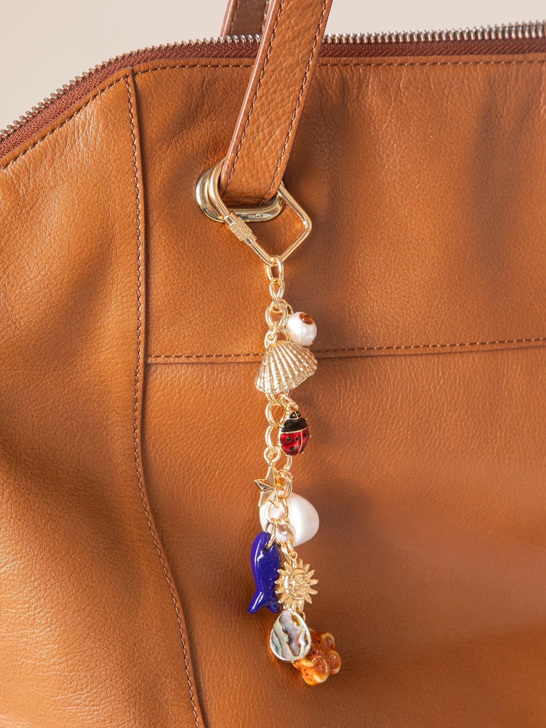 Gold Sun Bag Charm Product Image