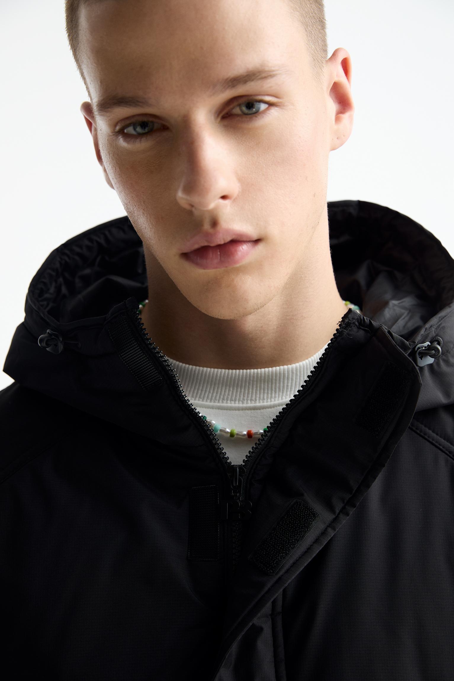 Jacket with pouch pocket and logo Product Image