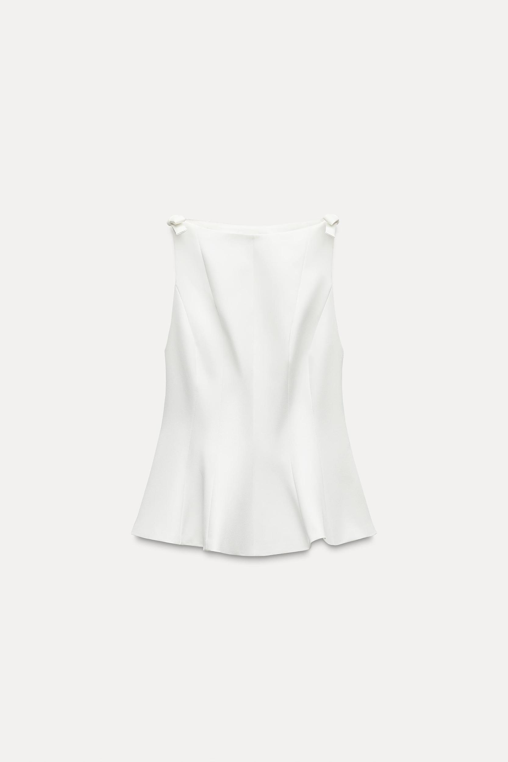 PEPLUM BOWS TOP Product Image