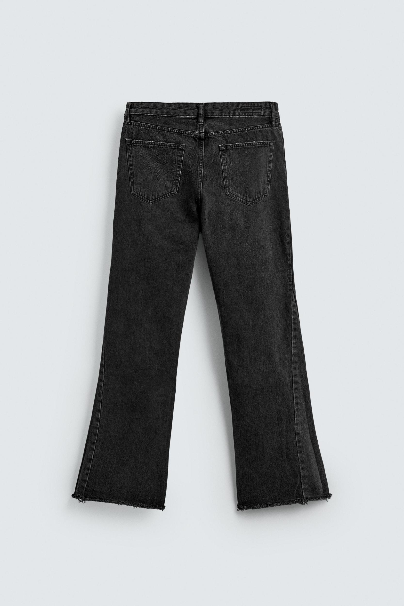 FLARE FIT RIPPED JEANS Product Image