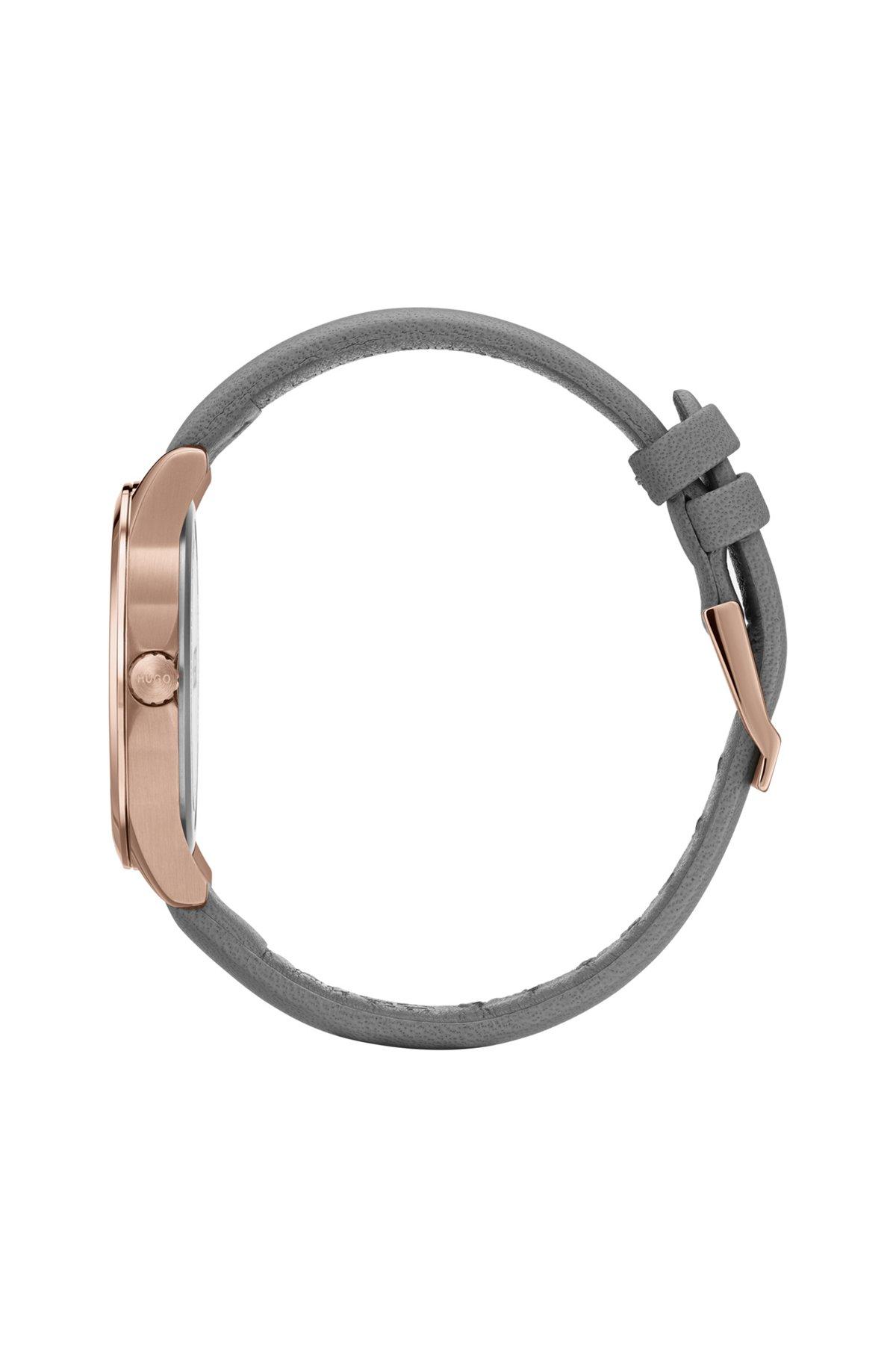 Carnation-gold-effect watch with reverse-logo dial Product Image