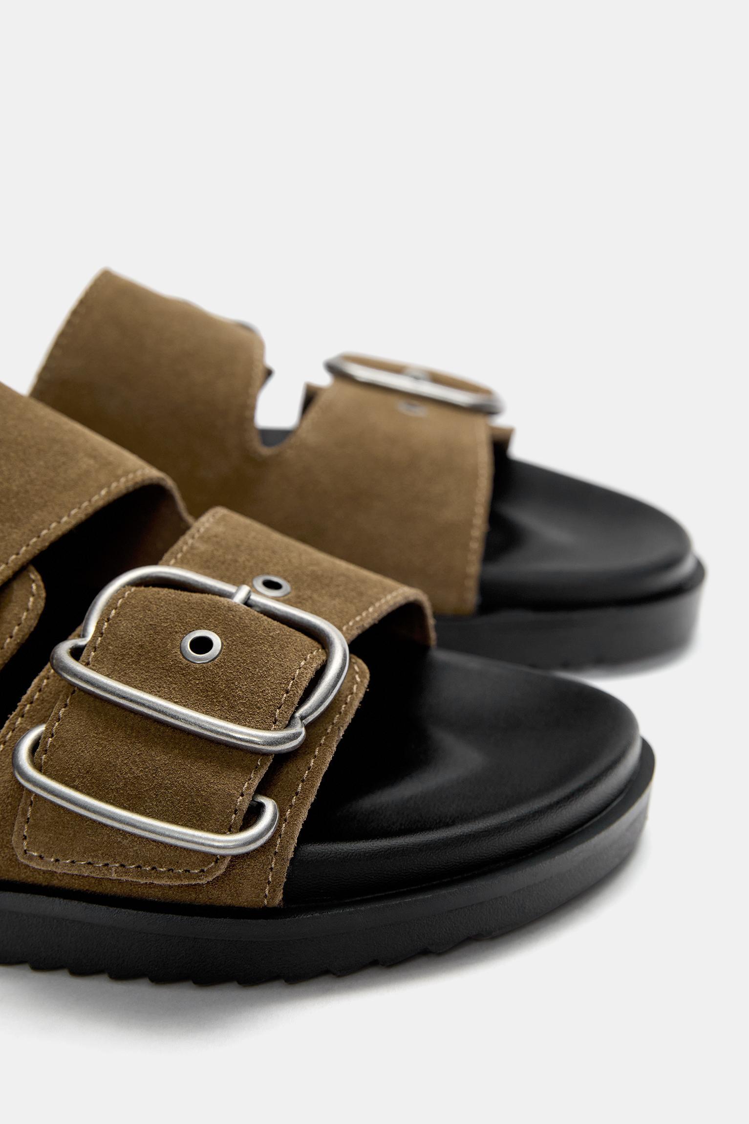 Leather flat sandals with buckles Product Image
