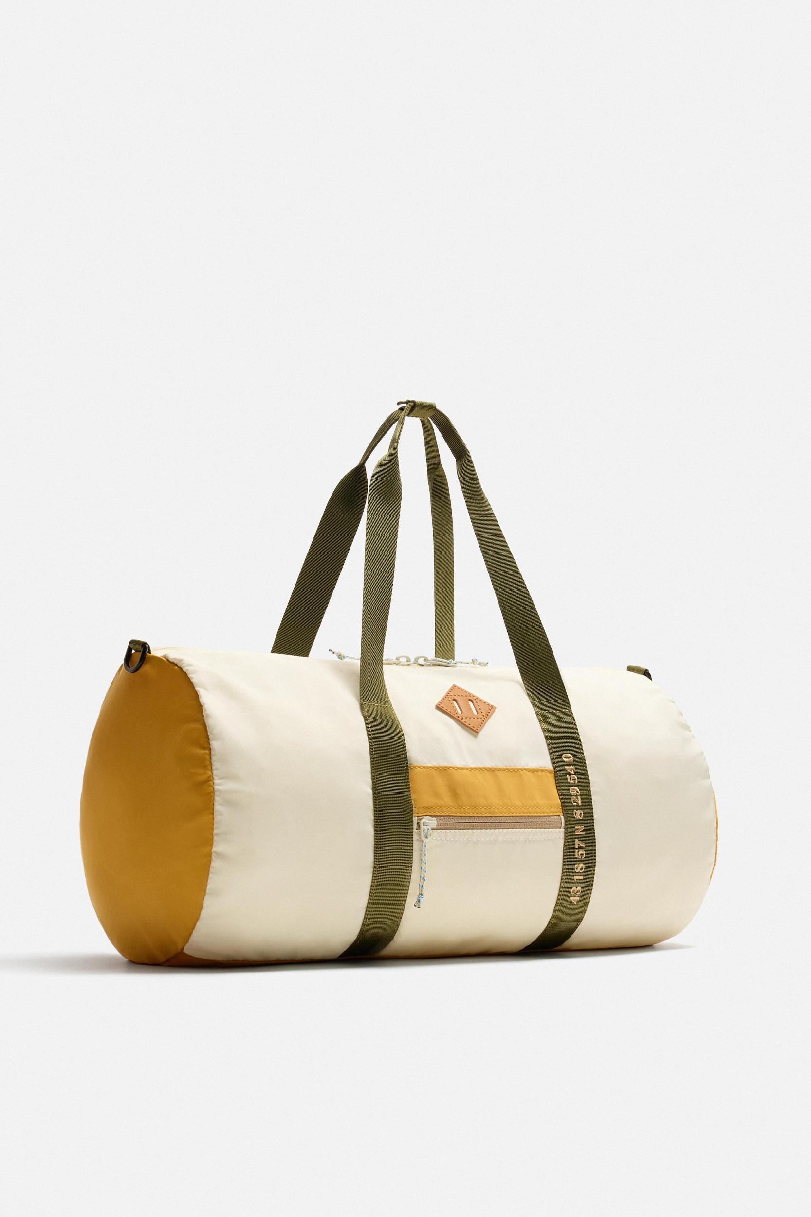 CONTRAST TRAVEL BAG Product Image
