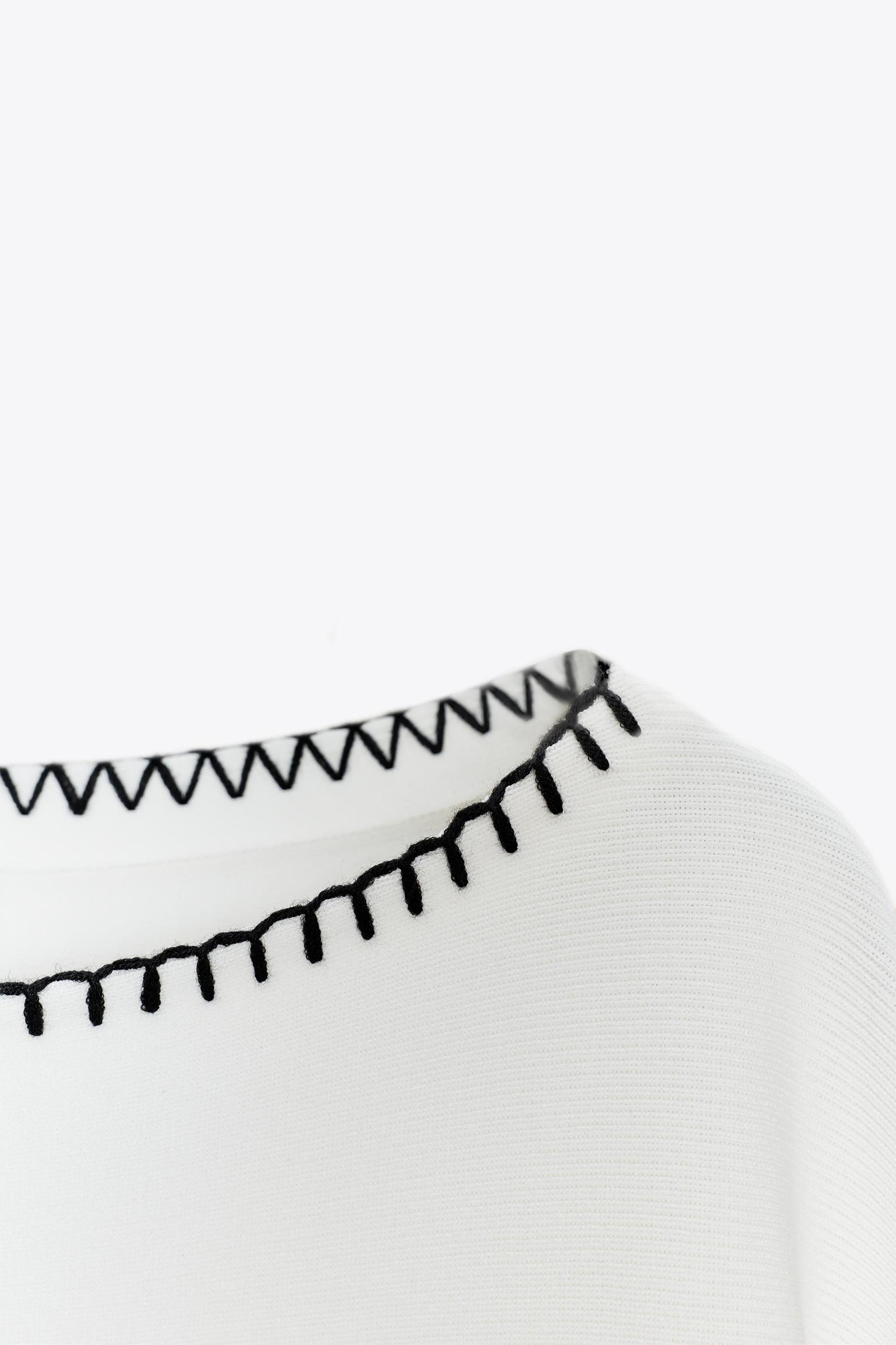 CONTRASTING EMBROIDERED KNIT TOP Product Image