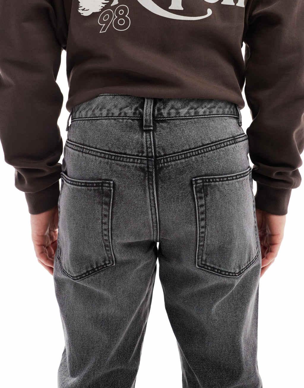 ASOS DESIGN tapered jeans in washed black Product Image