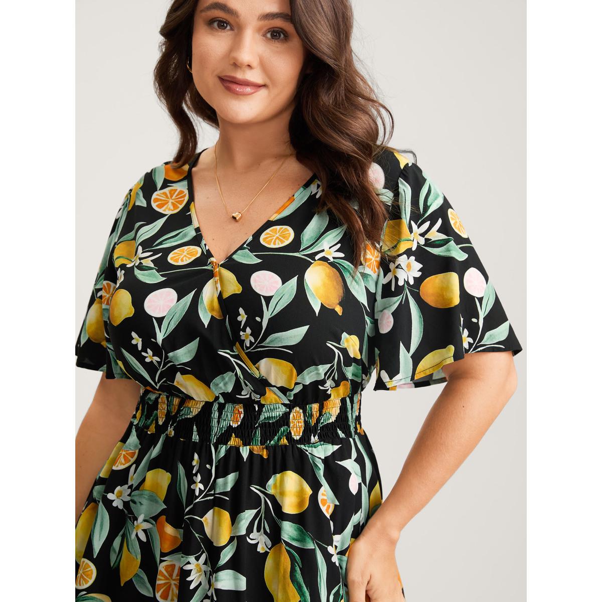 Plus Size Citrus Print Overlap Neck Shirred Midi Dress Black Women Timeless Overlap Collar Short sleeve Curvy BloomChic 14-16/1X Product Image