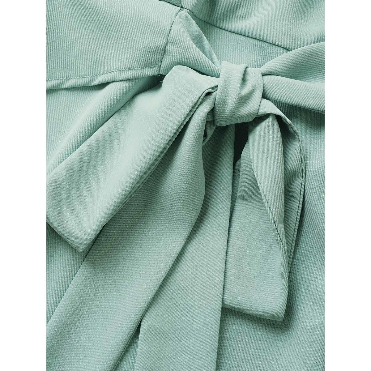 Plus Size Static-Free Overlap Collar Pleated Tie Knot Dress Mint Women At the Office Overlapping Overlap Collar Short sleeve Curvy Midi Dress BloomChic 26/4X Product Image