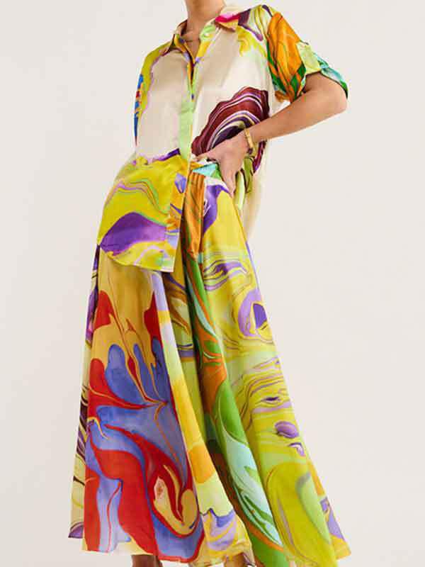 Loose Asymmetric Printed Lapel Blouse + A-Line Drawstring Elasticity Skirt Two Pieces Set Product Image