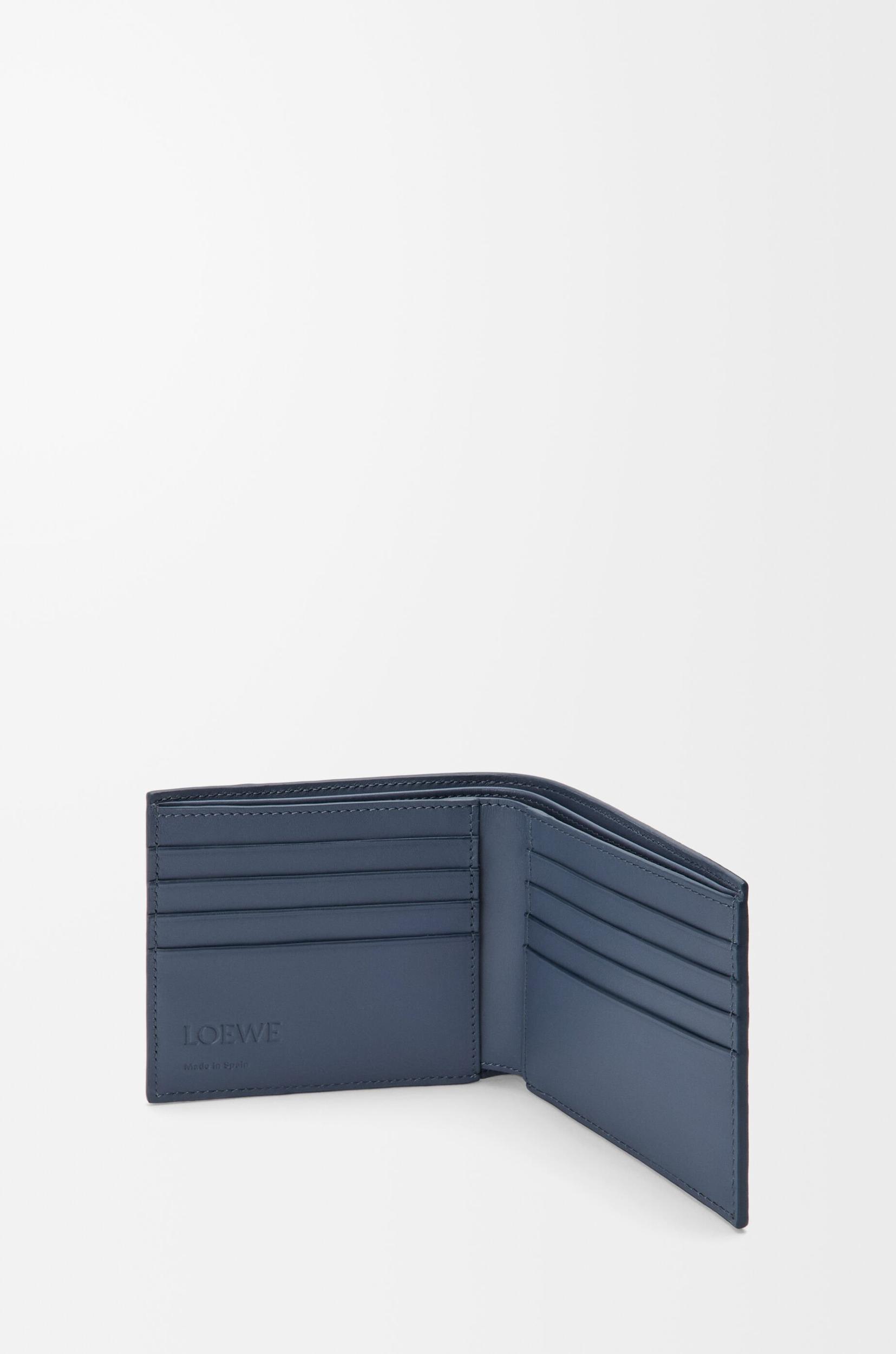 Puzzle bifold wallet in classic calfskin Product Image
