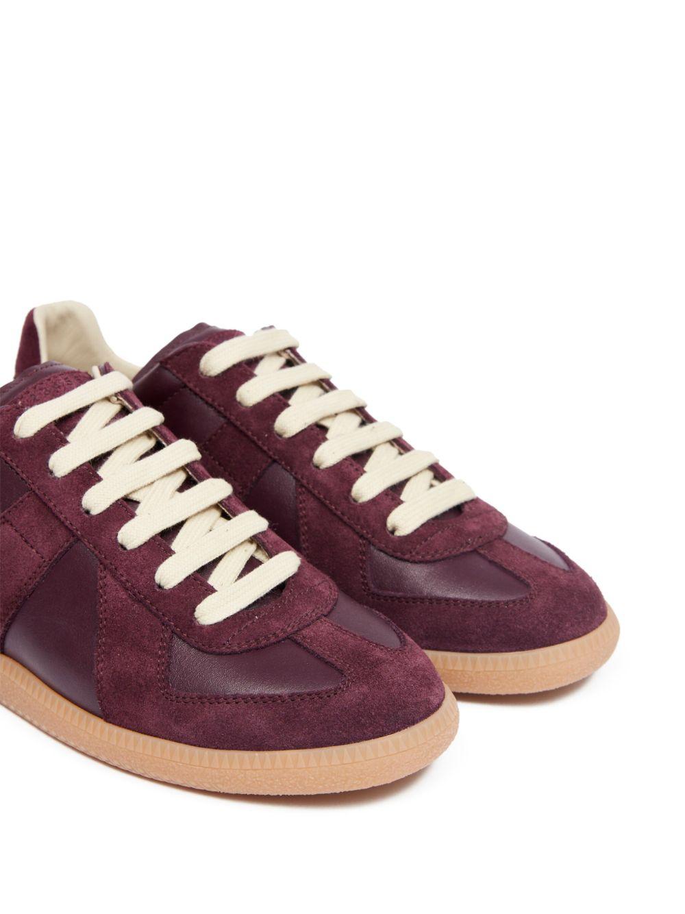 Replica low-top leather sneakers Product Image