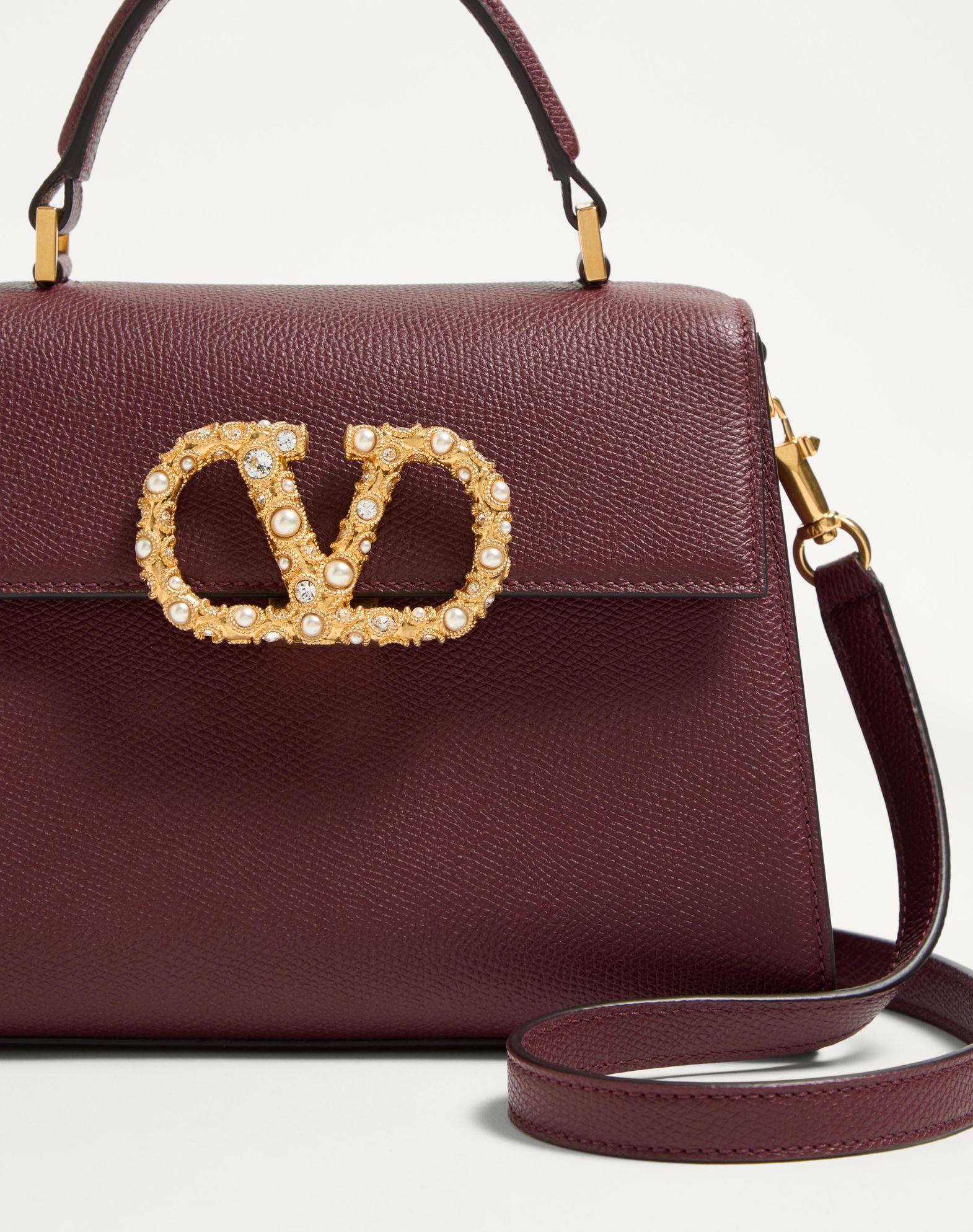 Valentino Garavani Vsling Small Handbag In Grainy Calfskin With Jewel Logo Product Image